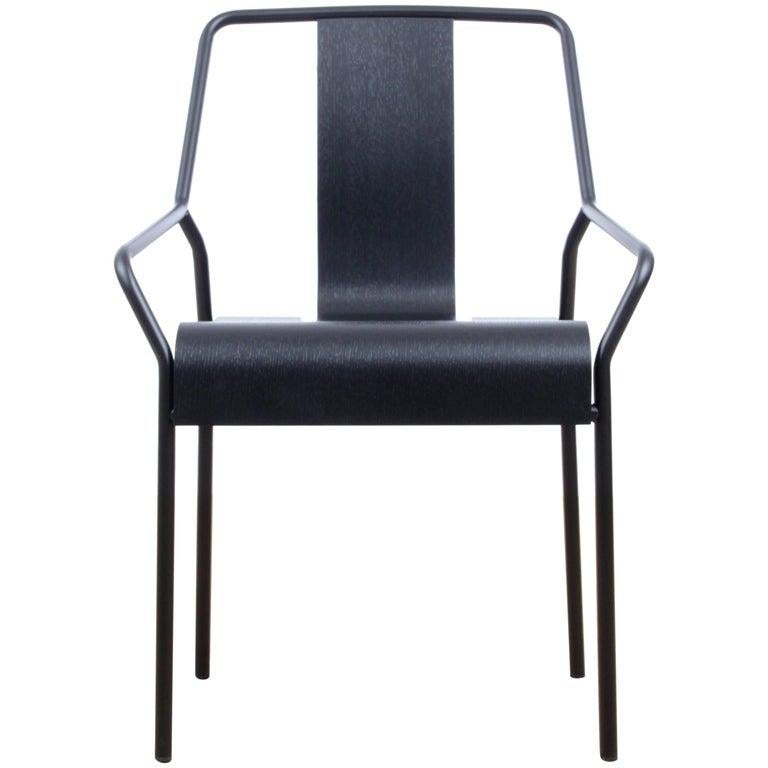 Chaise DAO de Shin Azumi 
MATERIAL : Chaise empilable, structure en métal laqué noir ou blanc. Dos en placage de chêne naturel ou laqué noir.
Technique : Métal laqué, bois naturel et teinté. 
Dimensions : L 56 x P 50,1 x H 80 cm
Également disponible