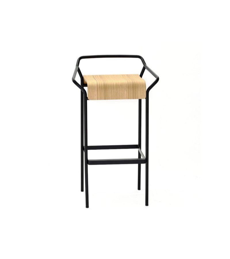 DAO high stool by Shin Azumi 
Materials: barstool, structure in black or white lacquered metal. Seat in oak veneer or black lacquer on plywood.
Technique: Lacquered metal, natural and stained wood. 
Dimensions: W 49 x D 40 x H 86 cm
Also