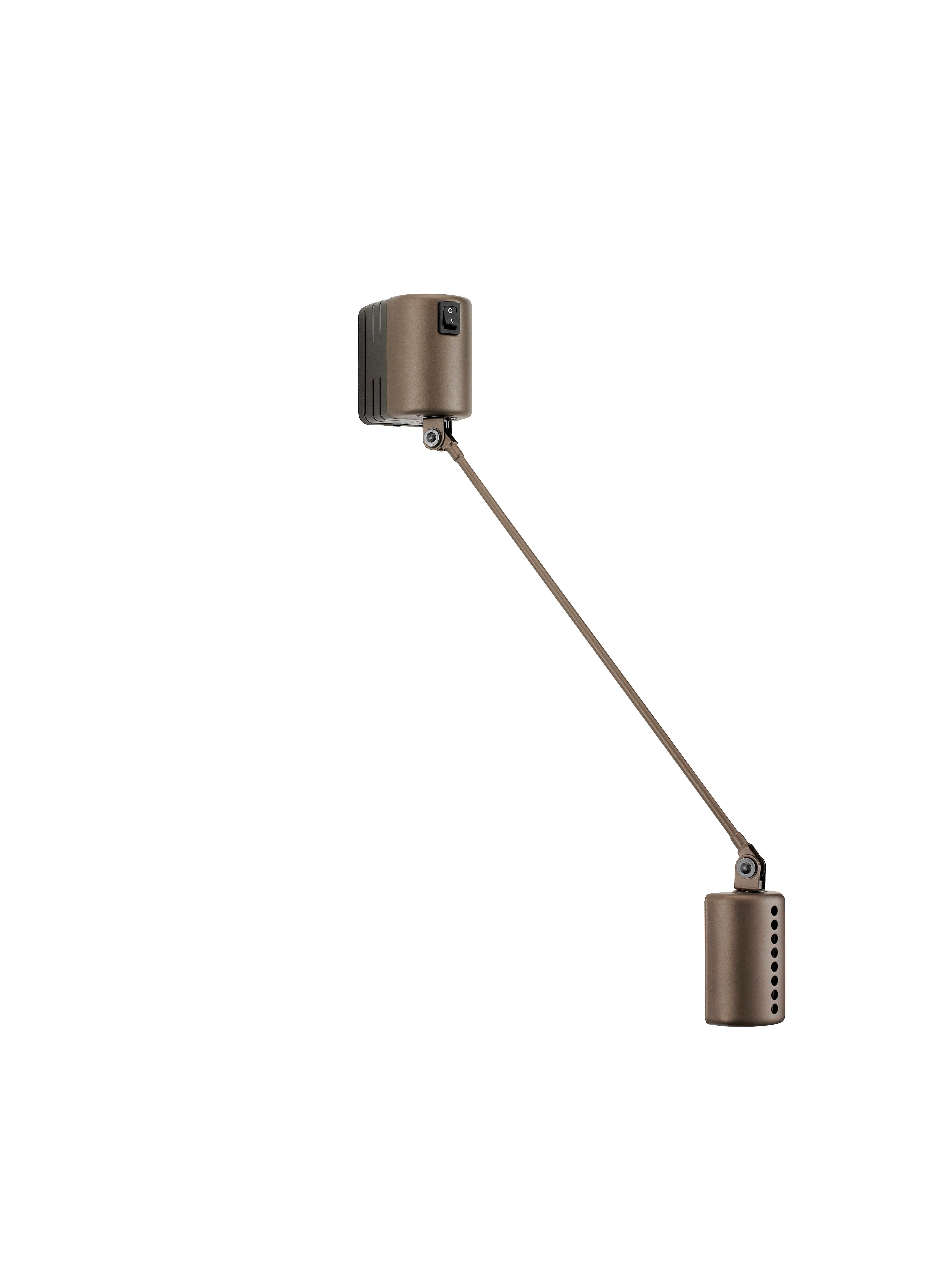 Daphine Parete wall light by Tommaso Cimini. Current production manufactured in Italy, by Lumina. Aluminum, varnished cast iron base. Wired for U.S. standards. Since 1975 this lamp has represented the essence of Lumina. It is displayed in some of