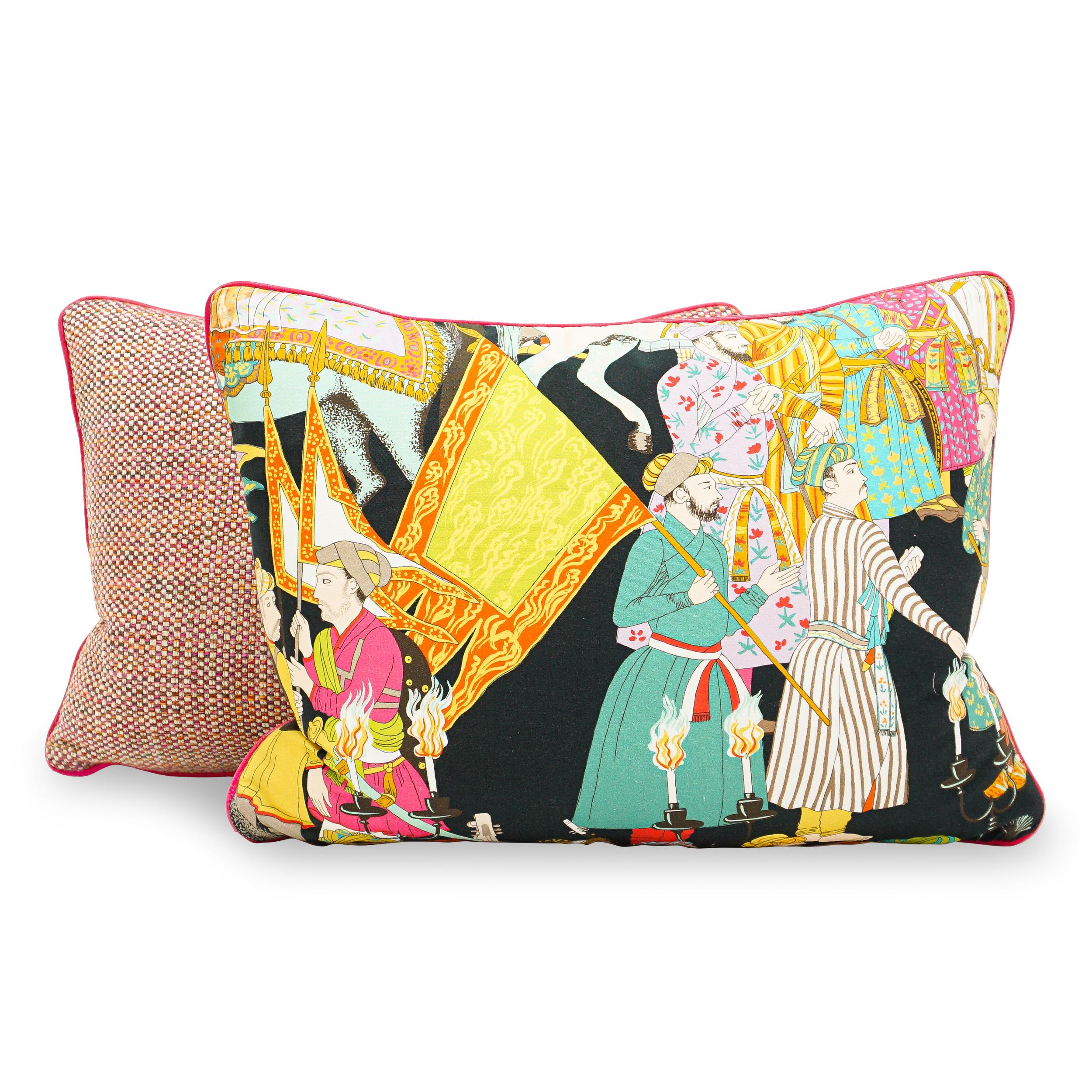 Colorful Manuel Canovas Indian Print on cotton on the front and a woven in similar colors on the back of this striking pillow. The finishing touch is the hot pink faux leather piping. Down/feather filled. 
Pillow can be made in any combination of