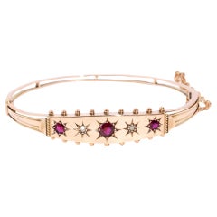 Antique Victorian Era Ruby & Diamond Hinged Bangle 9 Carat Yellow Gold
