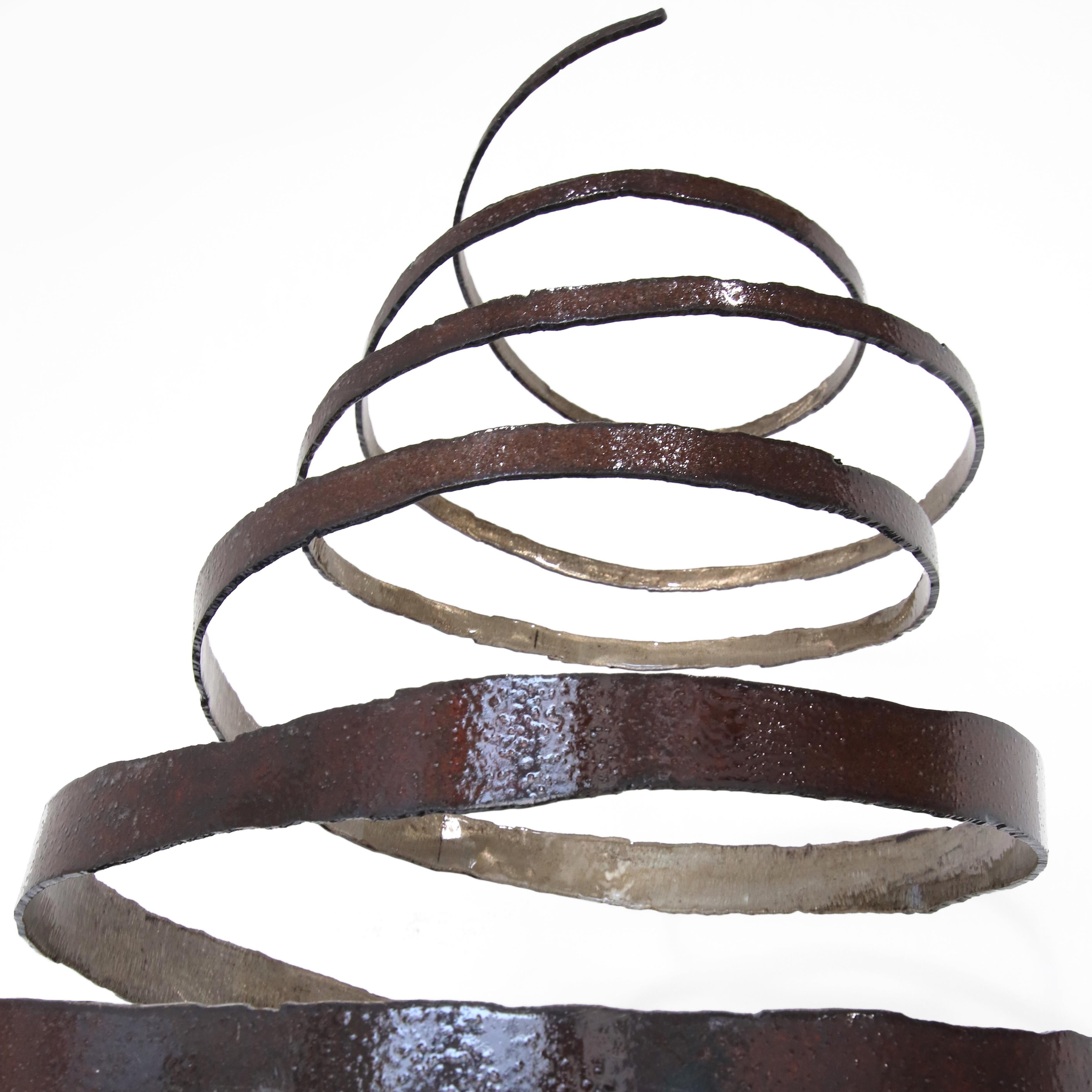 Focusing on making human-scale, abstract, minimalist, and often kinetic sculptures, D'Arcy Bellamy creates art exclusively from steel pipe. Bellamy’s work is characterized by flowing lines, strong negative space, originality, movement, and shadows.
