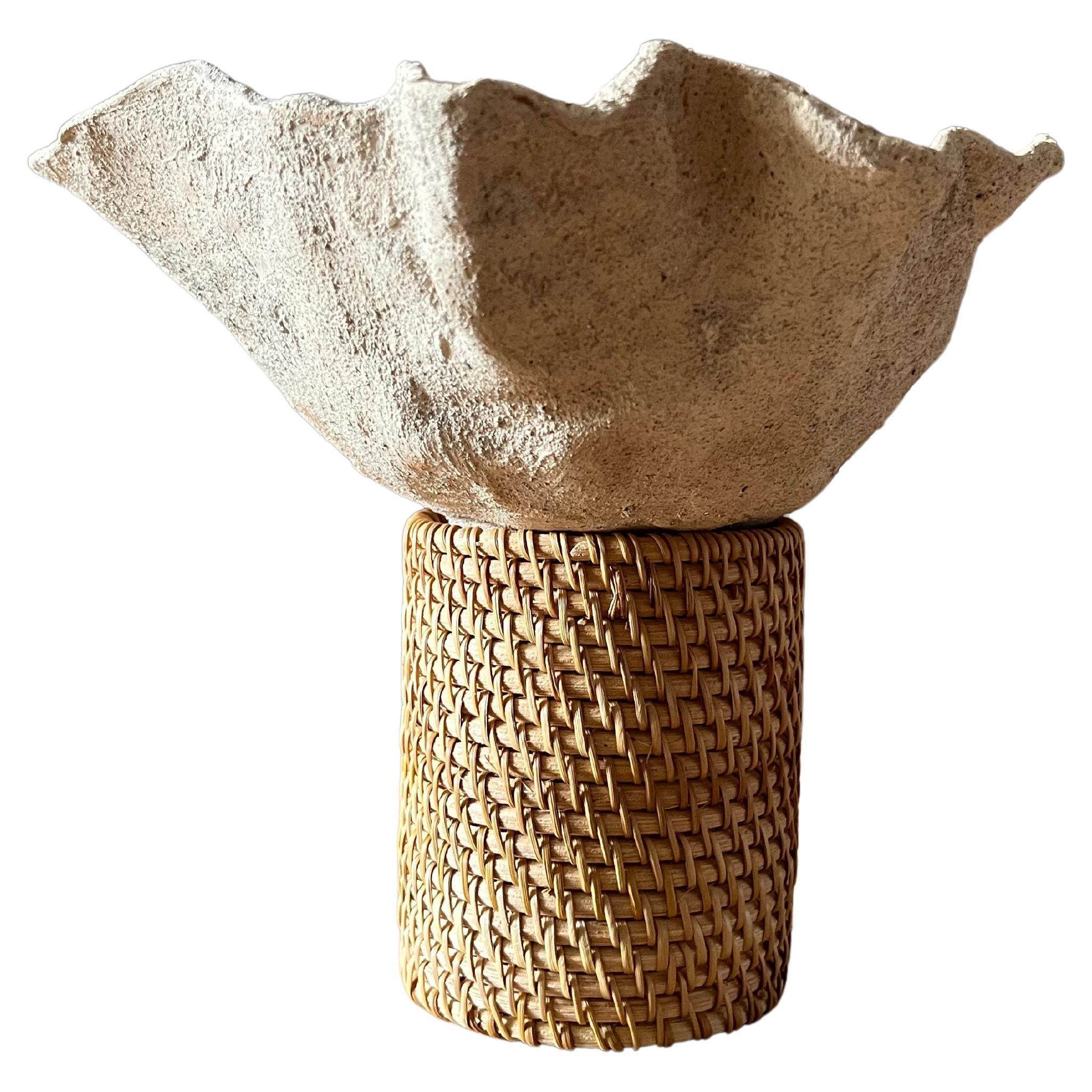 DARE FORMA ALLA TERRA/ SANTORINI (GR). Vaso con terra, sabbia di ferro e rattan For Sale