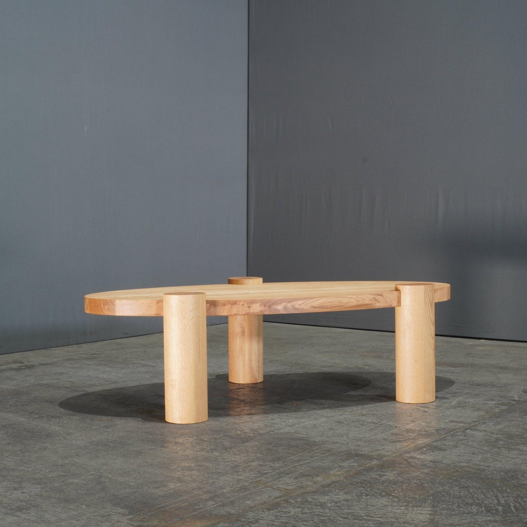 The Clyde Coffee Table by Sean Dare for Dare Studio showcases refined craftsmanship with a striking modernist aesthetic. Crafted from premium solid wood, its clean, sculptural silhouette offers both form and function. The beautifully curved legs and