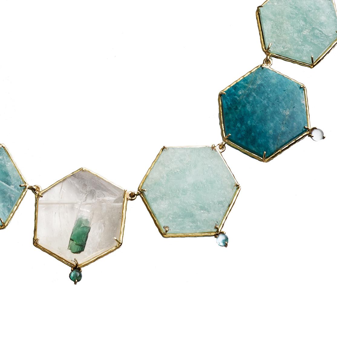 Gorgeous hexagonal shapes of natural rough and polished aquamarine and amazonite are set in marquise-engraved 18k yellow gold in this special Daria de Koning masterpiece. A centerpiece hexagonal stone features a fragment of a blue-green tourmaline
