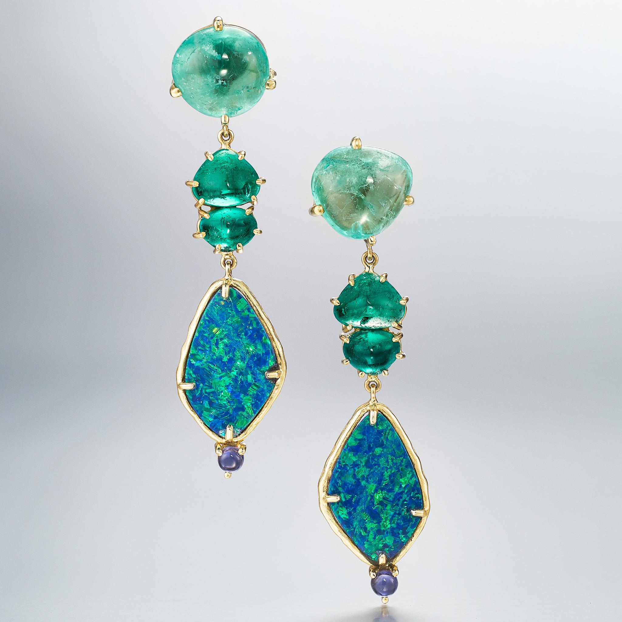 In collaboration with Muzo, the famed emerald mines in Colombia, these earrings feature 16.50 carats of free-form nugget and trillion cabochon-cut emeralds, and 7.37carats of black opal doublet on natural matrix. A small accent of navy iolite
