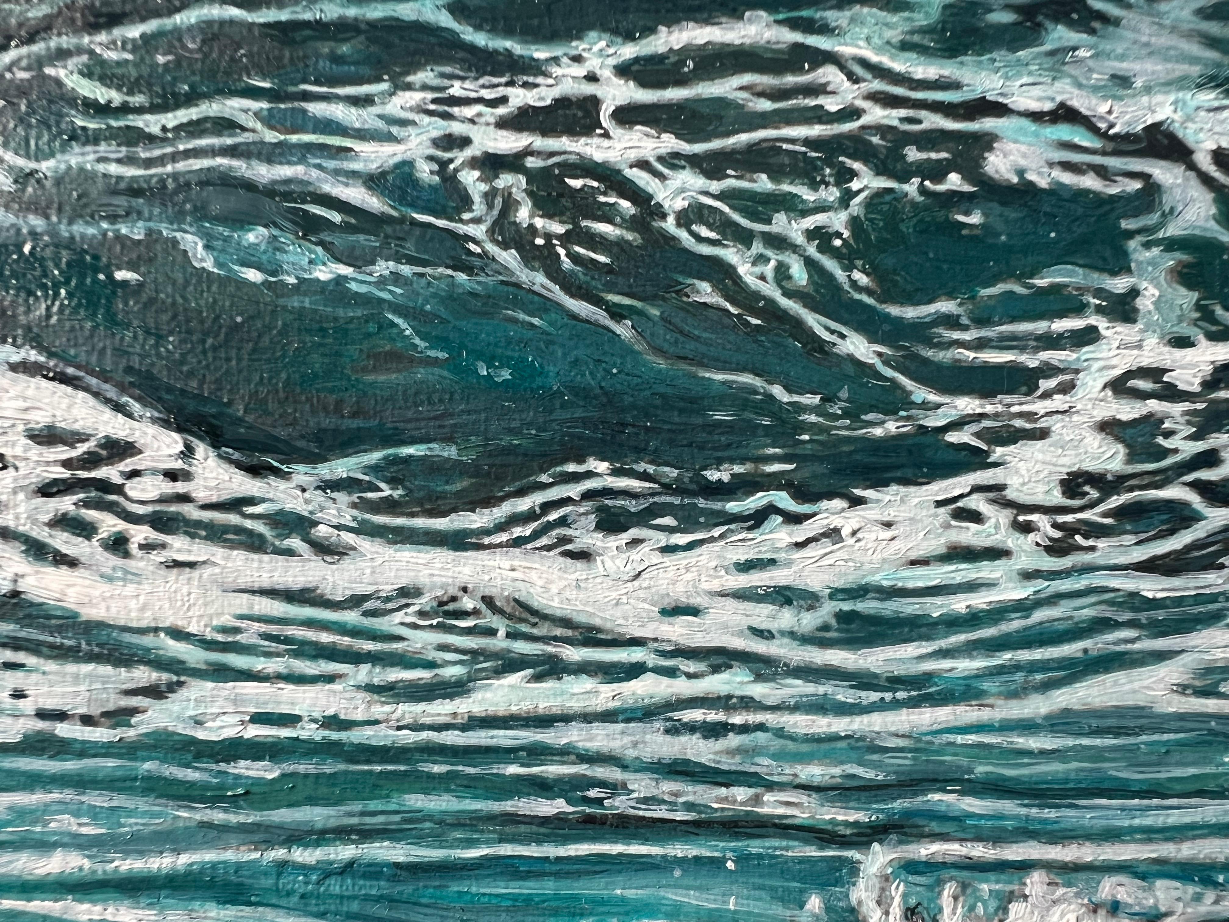 A wave rises — calm, steady, full of quiet power.
There is no noise here, only the deep breath of the ocean.
