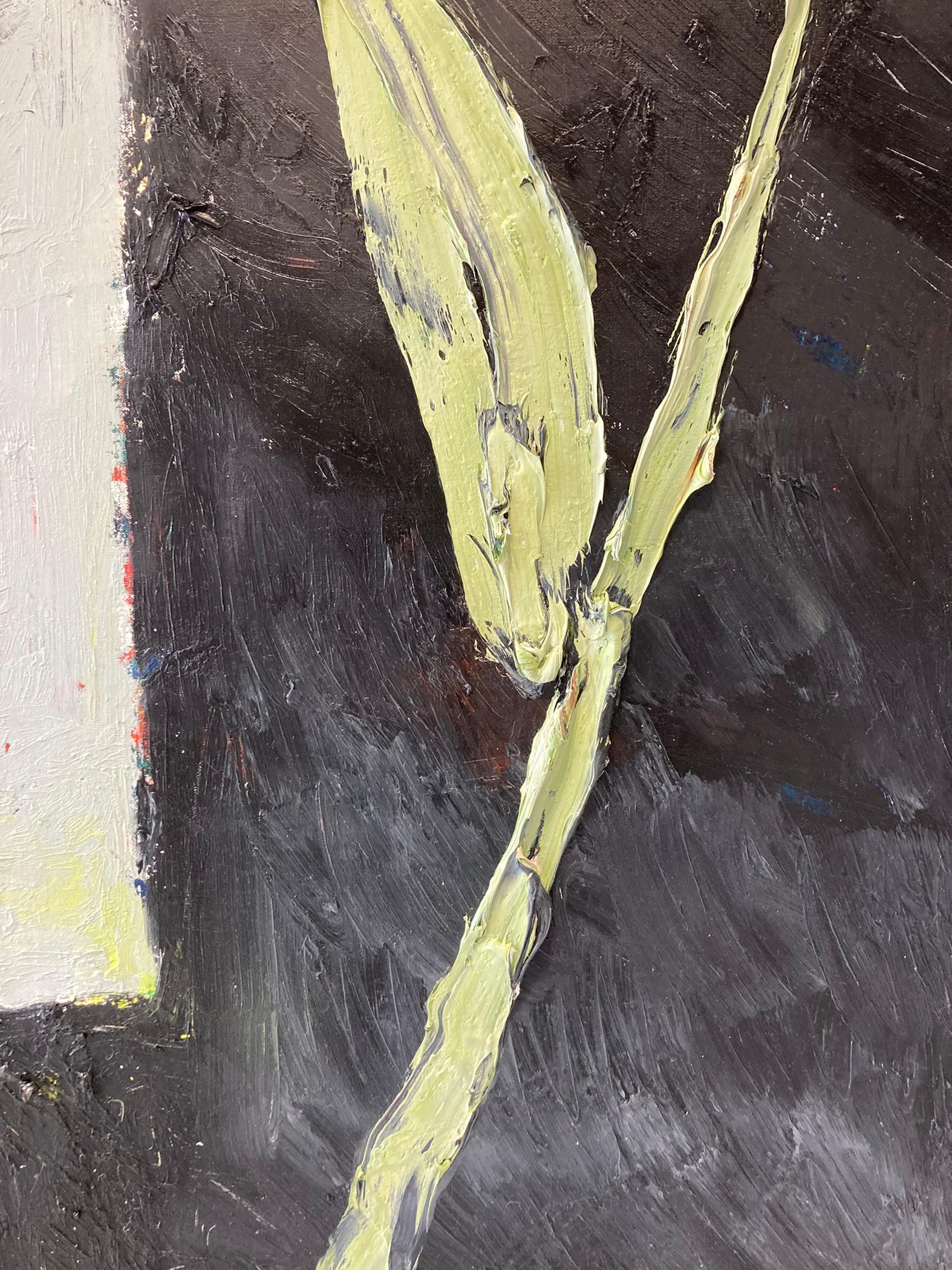 An abstract painting of a single lily. The lily sits on the righthand side of the composition against a textured black background. The sage green, grey field on the left of the composition could be a window, with a cool winter like brightness