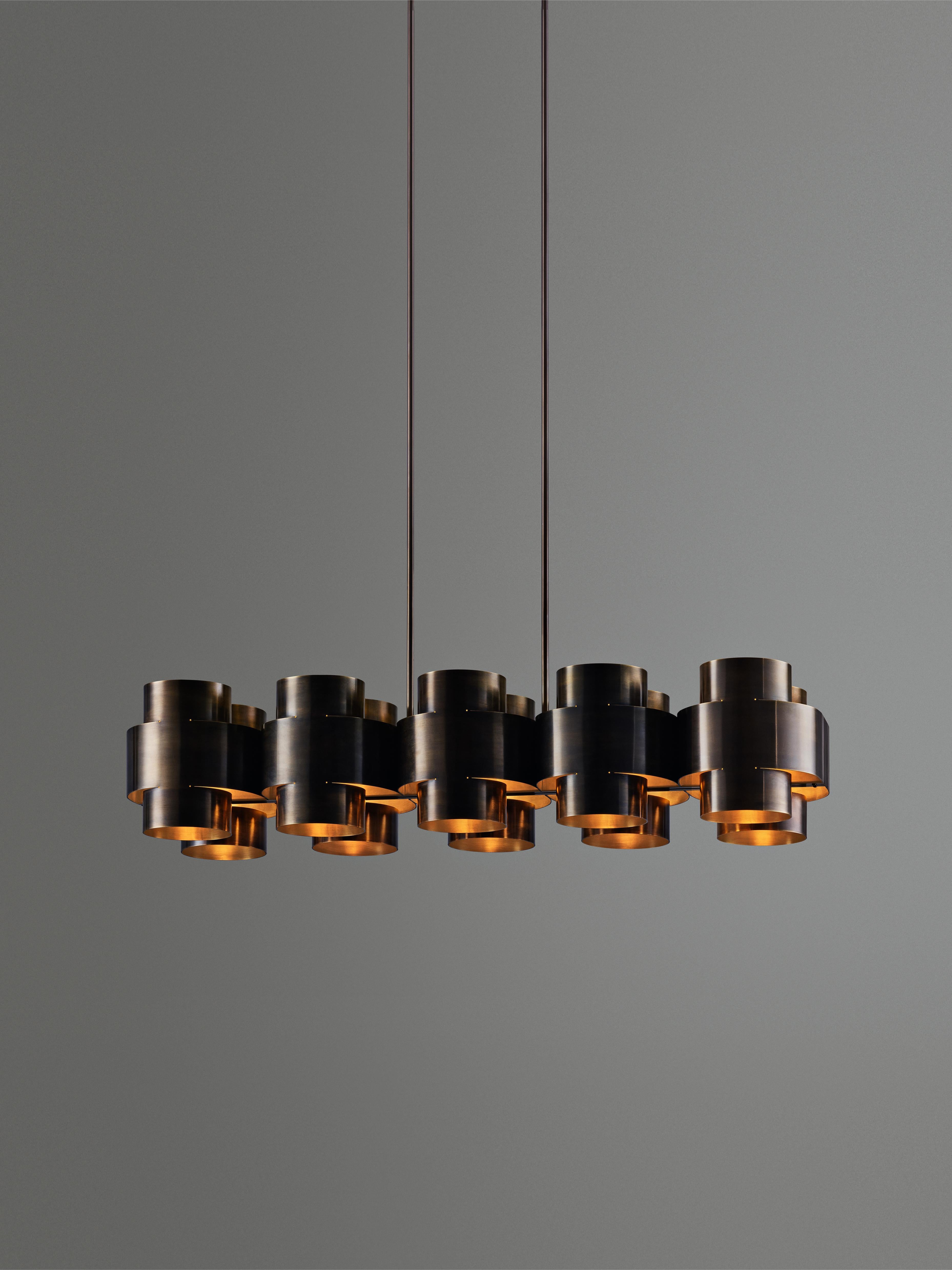 Modern Dark Aged Brass Plus Ten Chandelier by Paul Matter For Sale