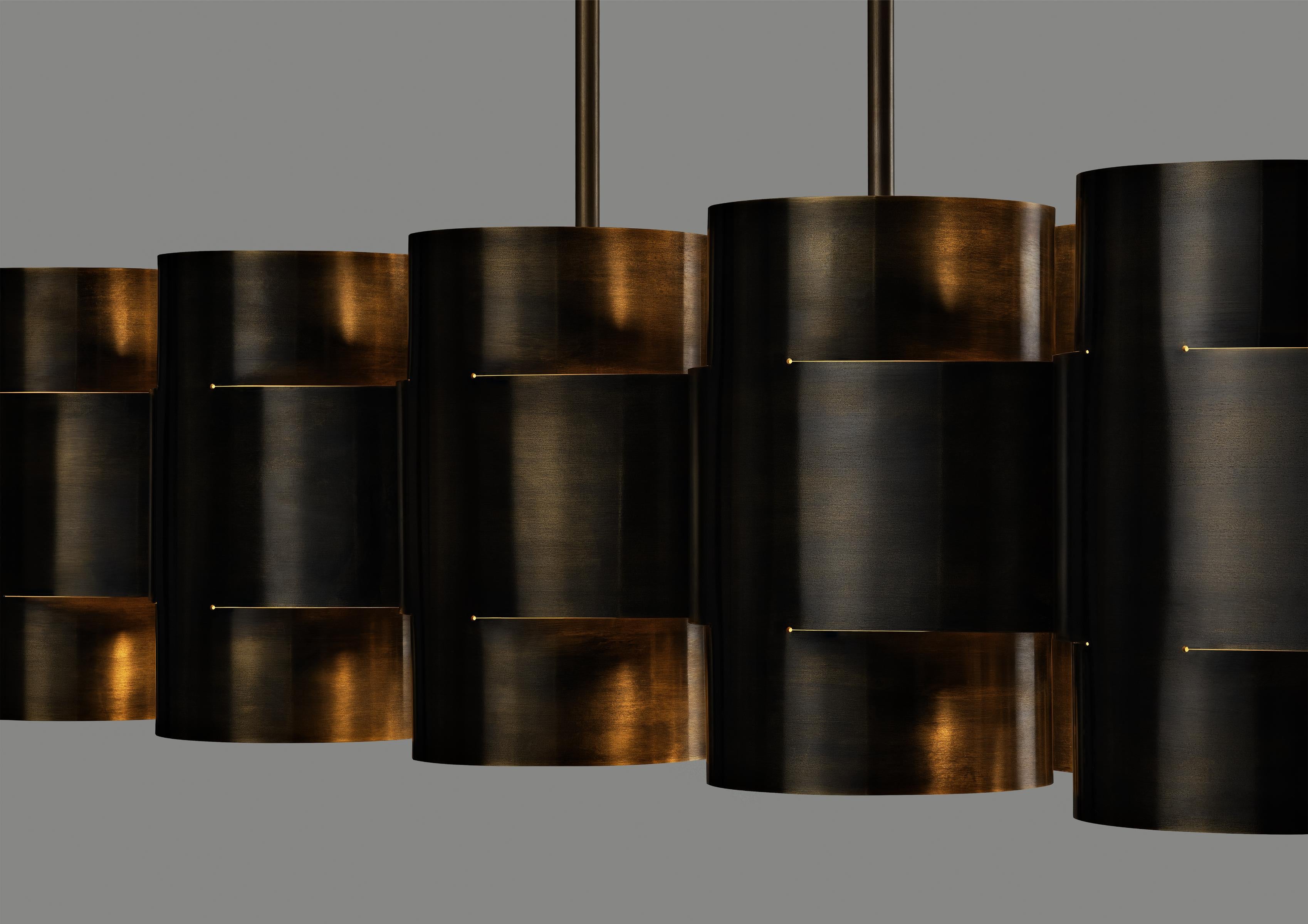 Indian Dark Aged Brass Plus Ten Chandelier by Paul Matter For Sale