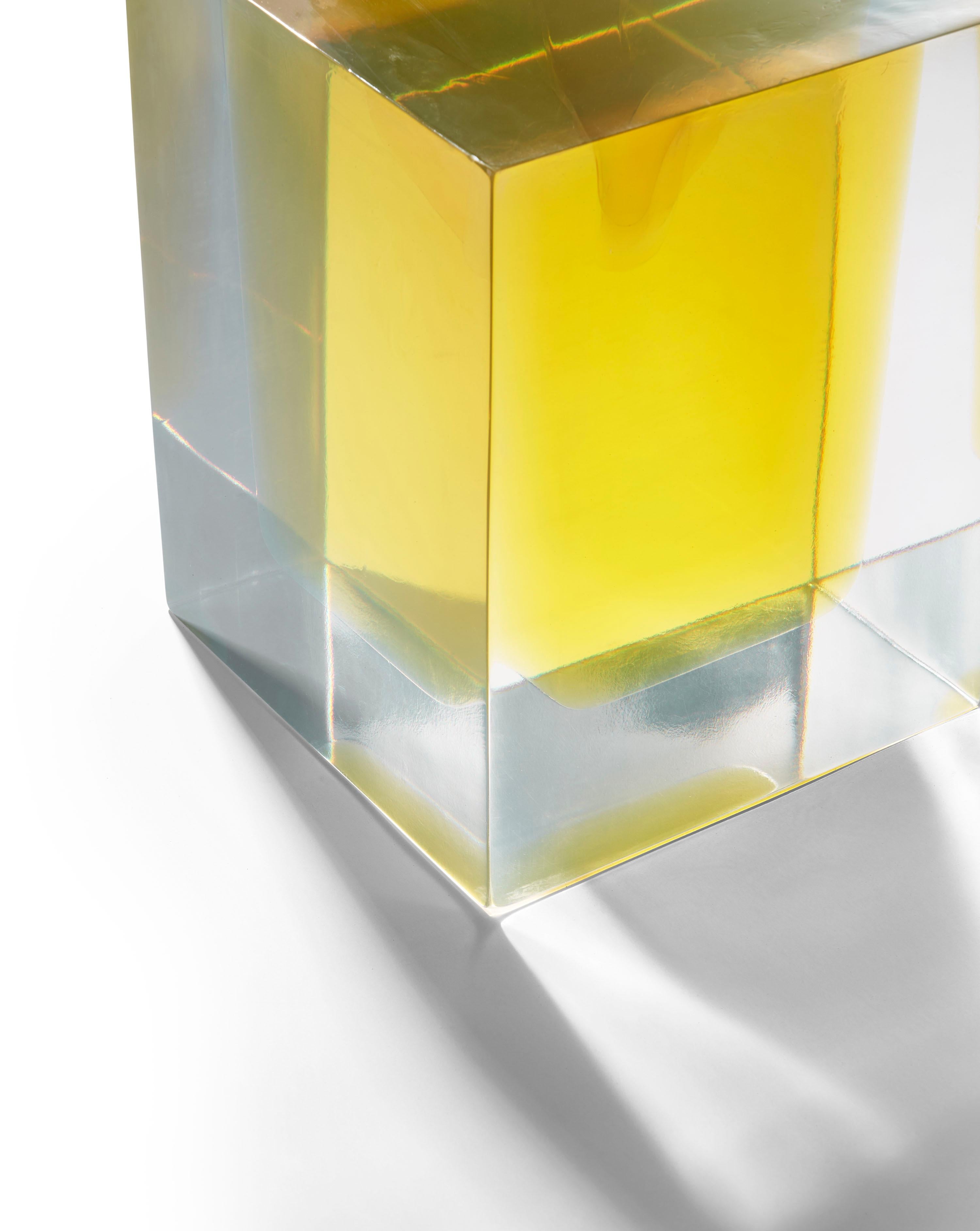 Item No: TA-026

Integrating clear and colored resins in stunning simplicity, the Dark and Stormy Table both captures and casts light in the surrounding space, creating colorful 