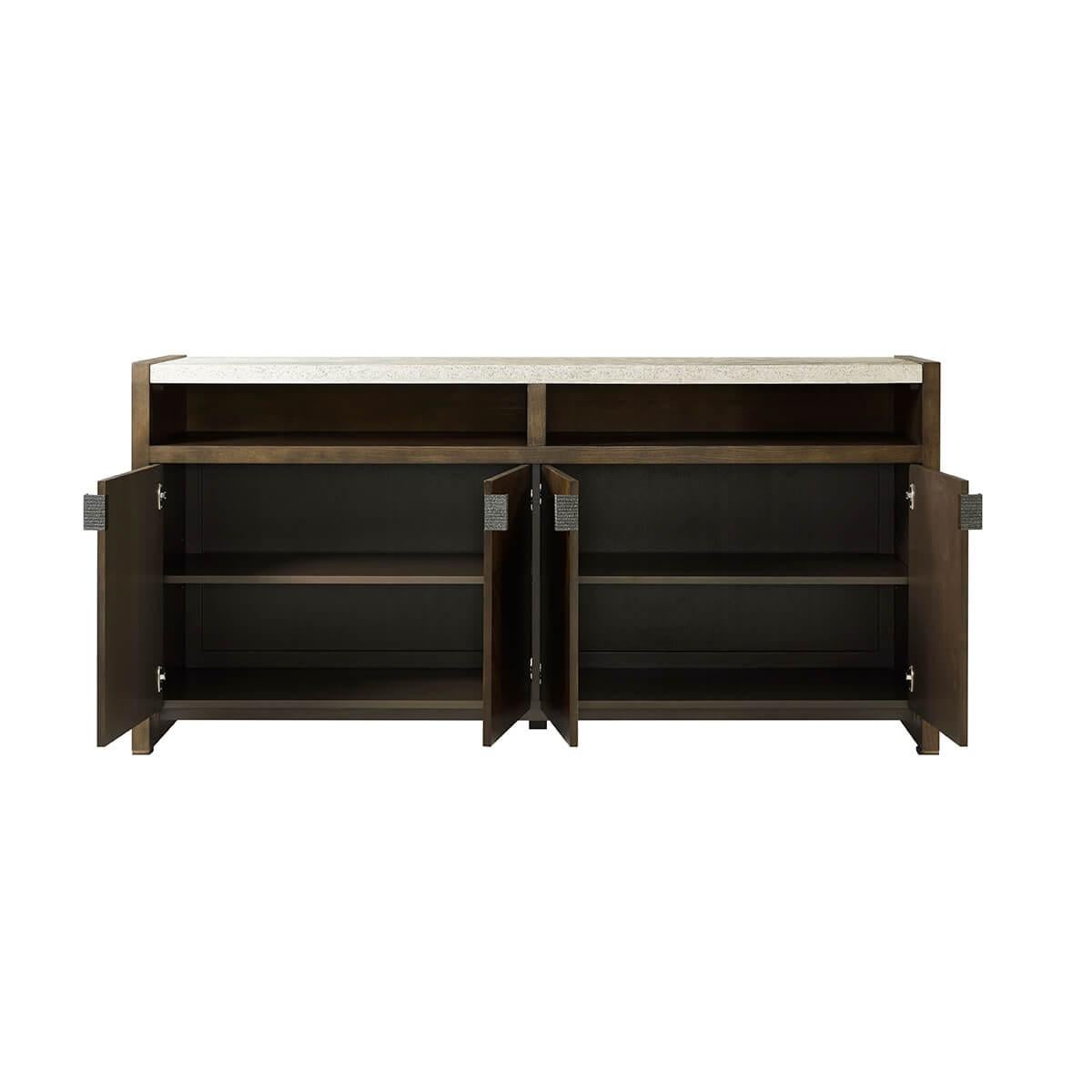 a minimalist four-door sideboard with peaceful symmetry in figured cathedral ash in our dark Earth finish, with metal pulls in Ember completed with a top done in our stone-like porous Mineral finish. 

With two open shelves and two adjustable