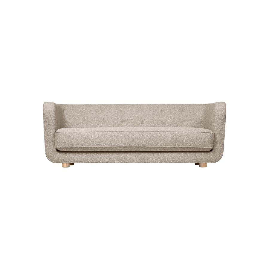 Dark beige and natural Oak Sahco Zero Vilhelm sofa by Lassen
Dimensions: W 217 x D 88 x H 80 cm 
Materials: Textile, Oak.

Vilhelm is a beautiful padded 3-seater sofa designed by Flemming Lassen in 1935. A sofa must be able to function in