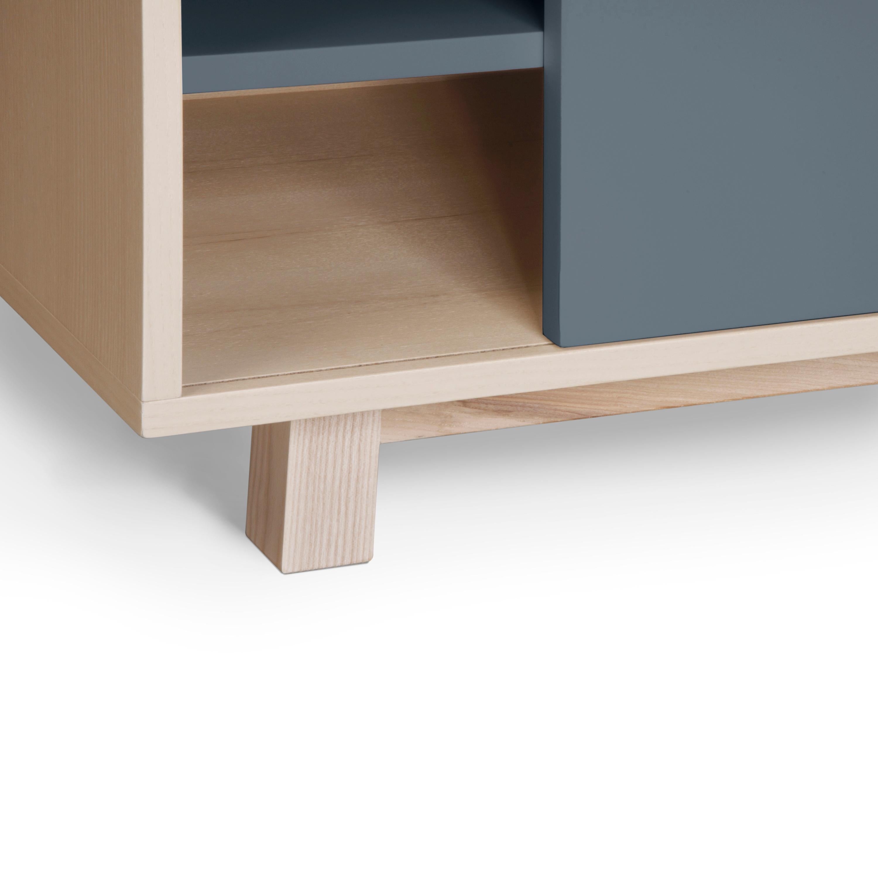 Contemporary Scandinavian 2 sliding door TV stand with 11 colours available, design E. Gizard For Sale