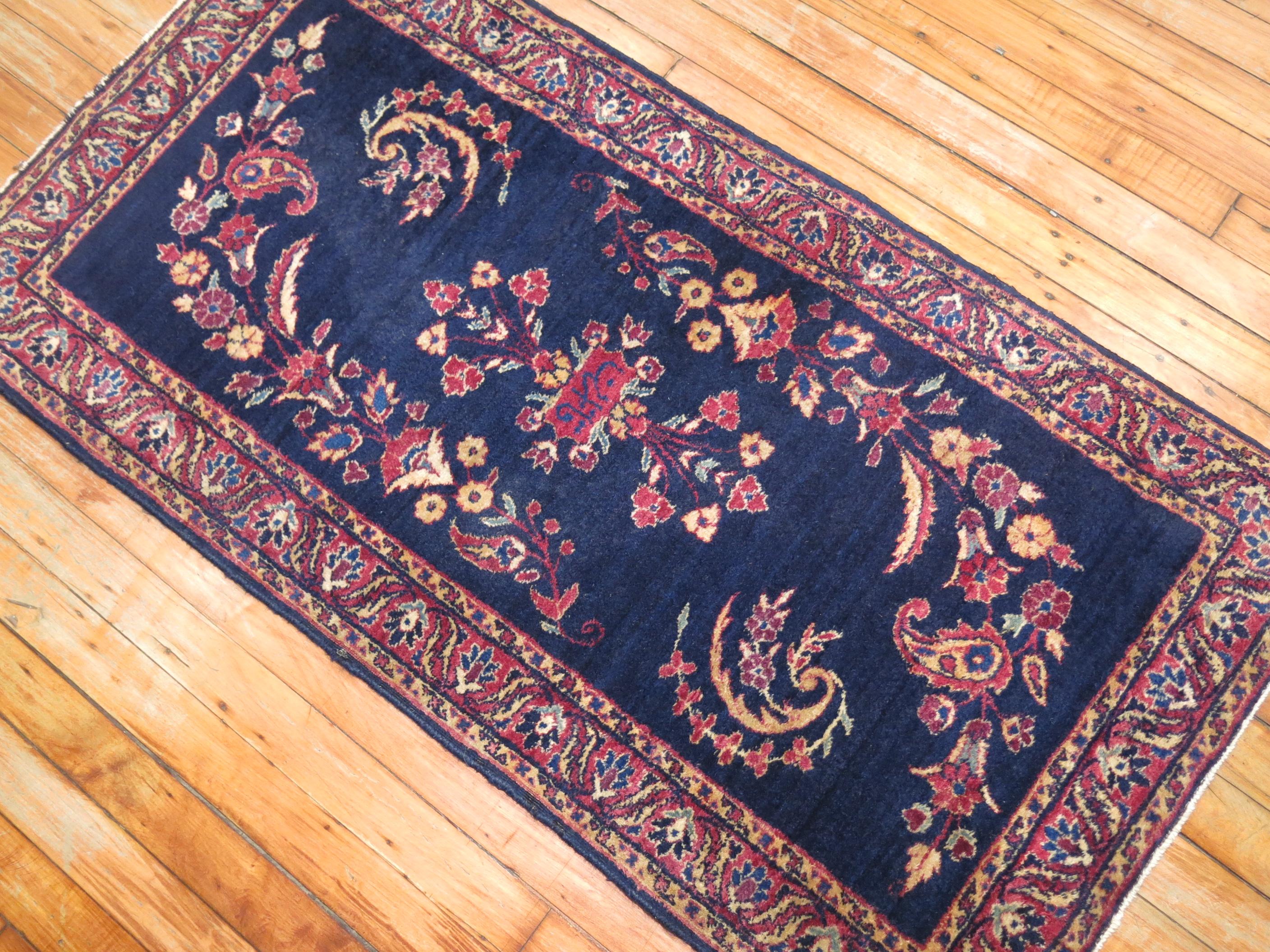 Early 20th century Persian Sarouk rug, signed by weaver.

2'1'' x 4'

 