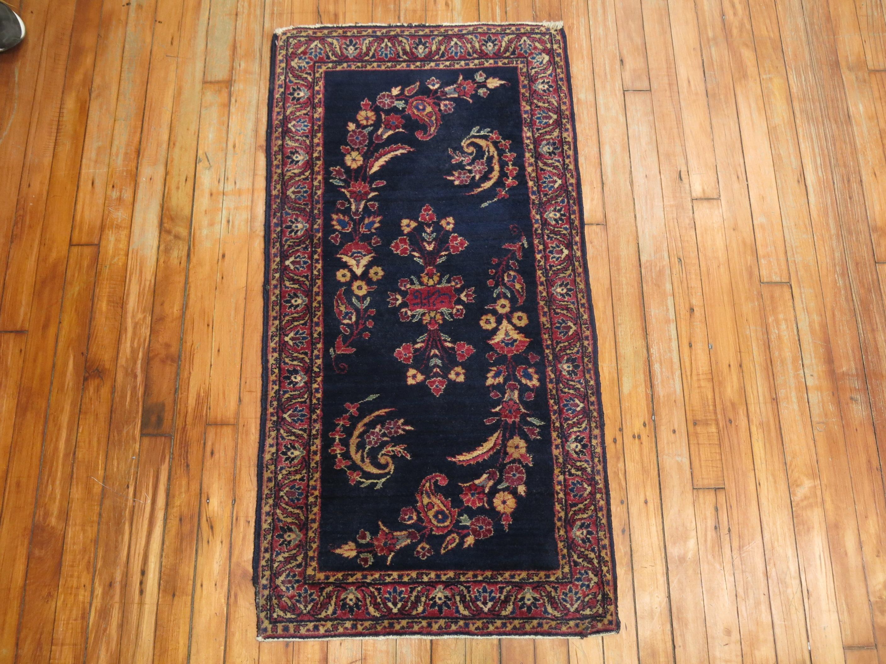 20th Century Dark Blue Antique Persian Sarouk Rug