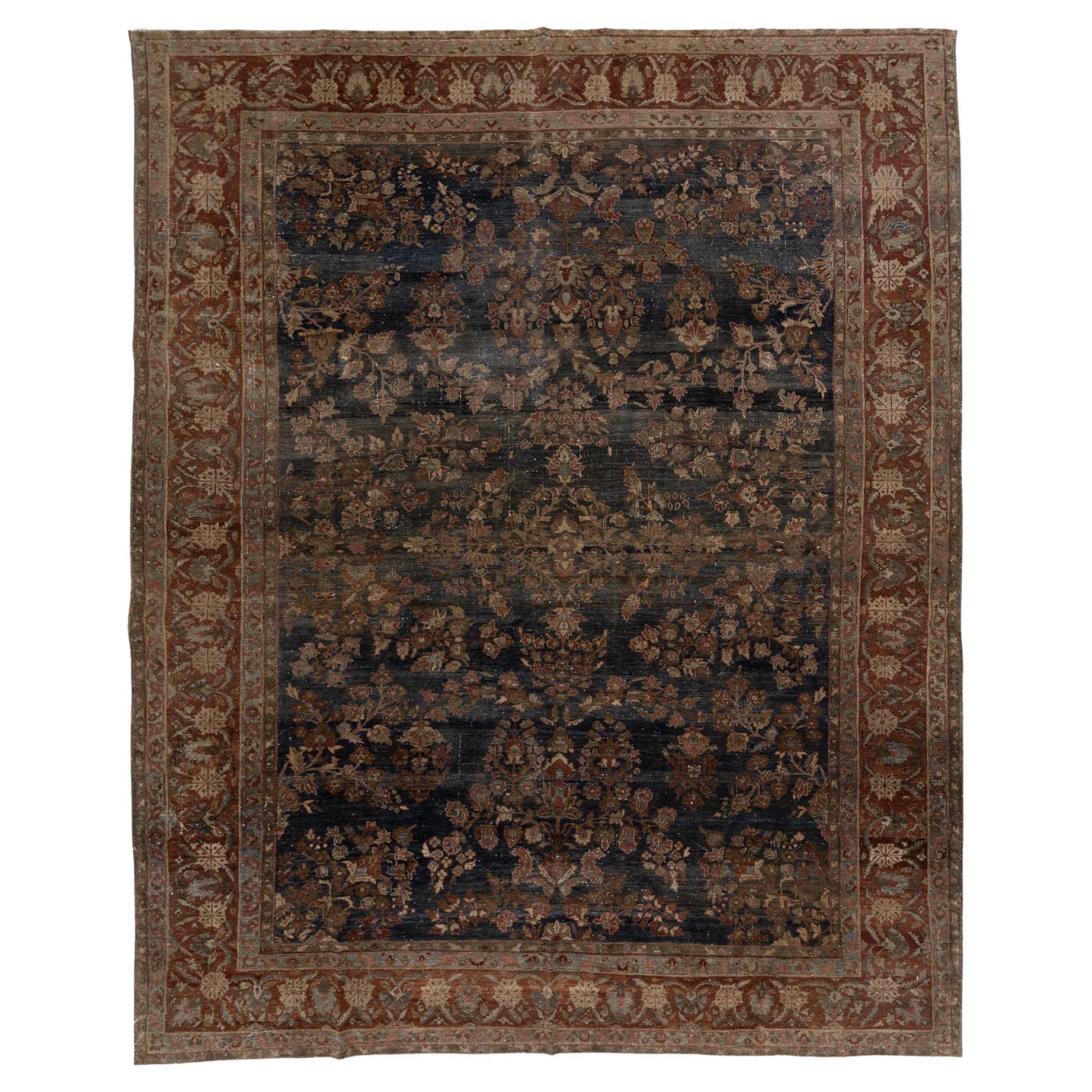 Dunkelblauer antiker persischer Sarouk-Teppich im Angebot