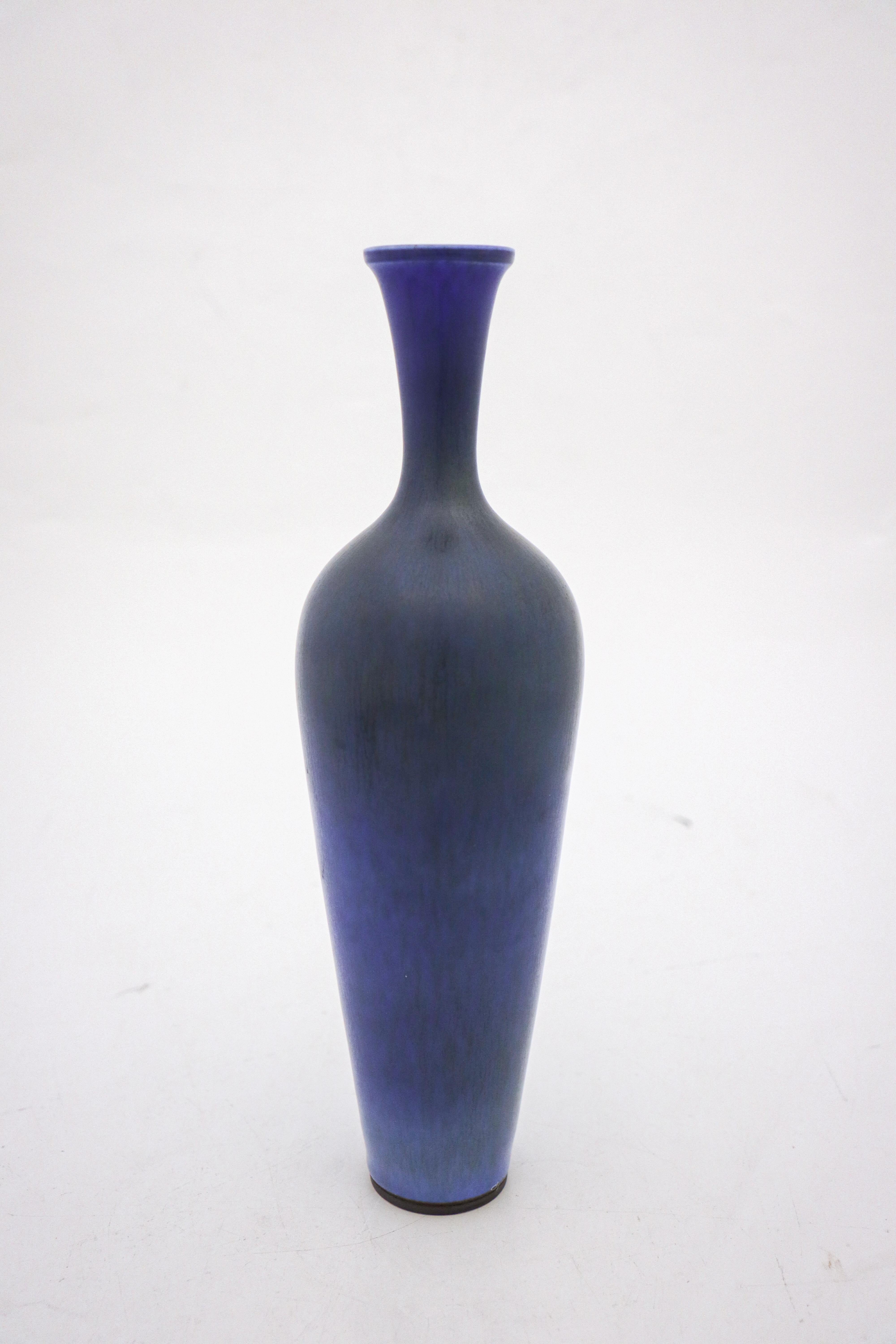 A lovely vase with a dark blue har fur glaze designed by Berndt Friberg at Gustavsberg in Stockholm, the vase is 27 cm high. It's marked as on picture and was made in 1960. It is in excellent condition.