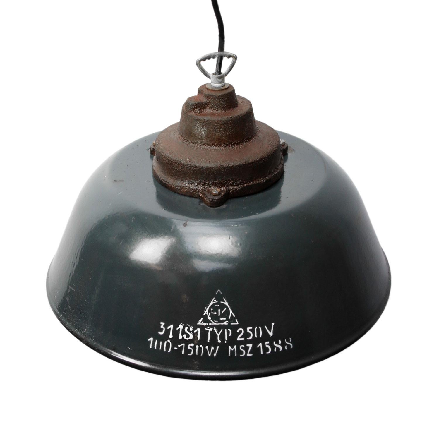 Factory pendant
dark blue enamel with white interior
white typography on outside
cast iron top.

Measures: Weight 3.20 kg / 7.1 lb

Priced per individual item. All lamps have been made suitable by international standards for incandescent