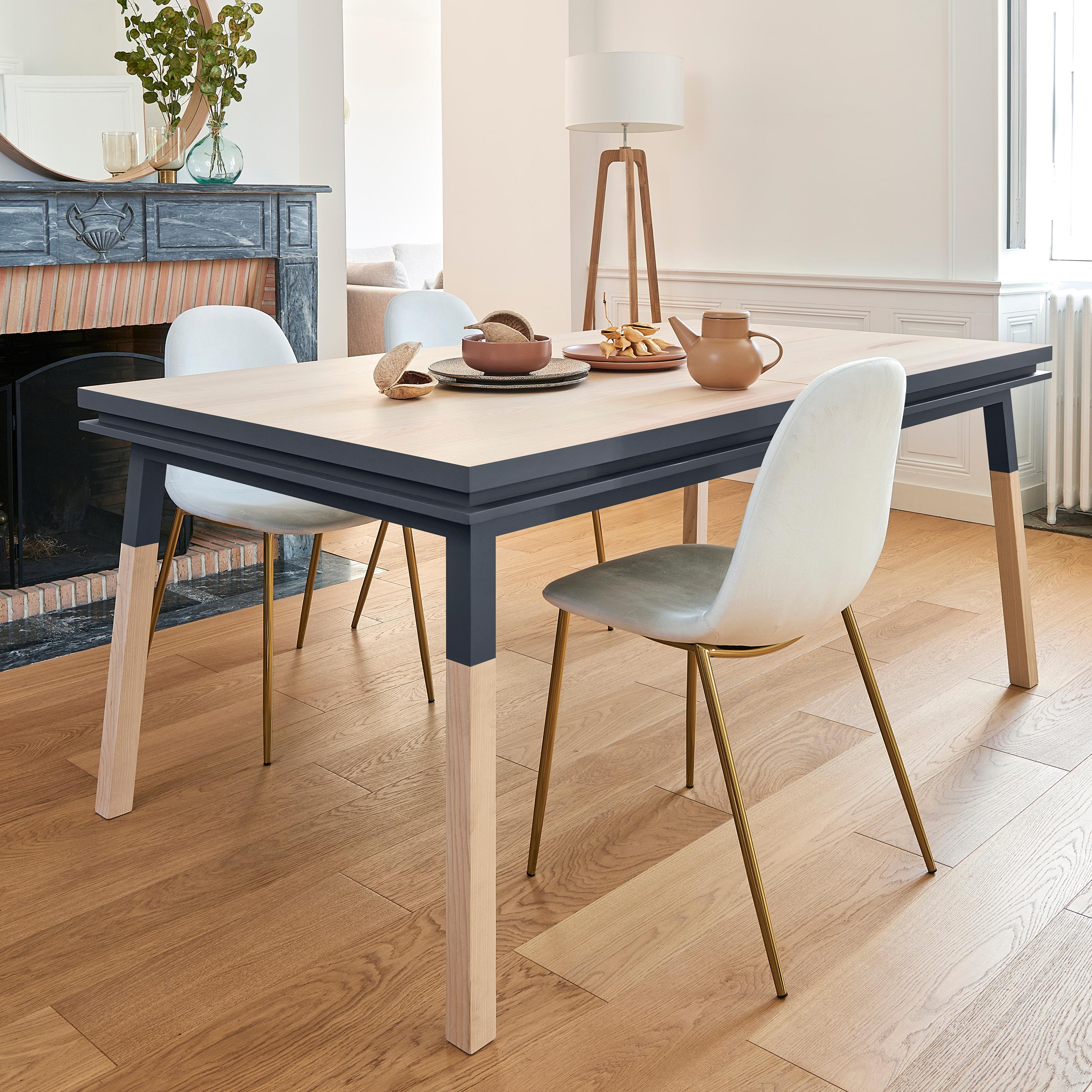 This rectangular dining table is proposed with 2 integrated and folded extensions. 

It is made of 100% solid ash wood from sustainably managed and PEFC certified French forests.

The 3 lengths are 190 cm / 74.8