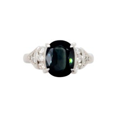 Dark Blue Green Sapphire Oval and White Diamond Cocktail Ring in Platinum