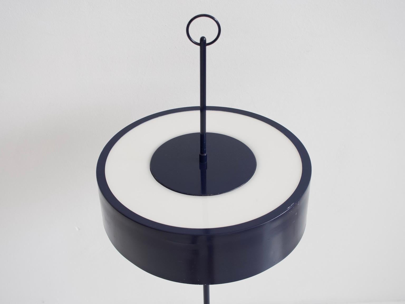 Floor lamp by a Scandinavian maker, circa 1960s-1970s. Dark blue lacquered metal, round base and shade, two-light sources.