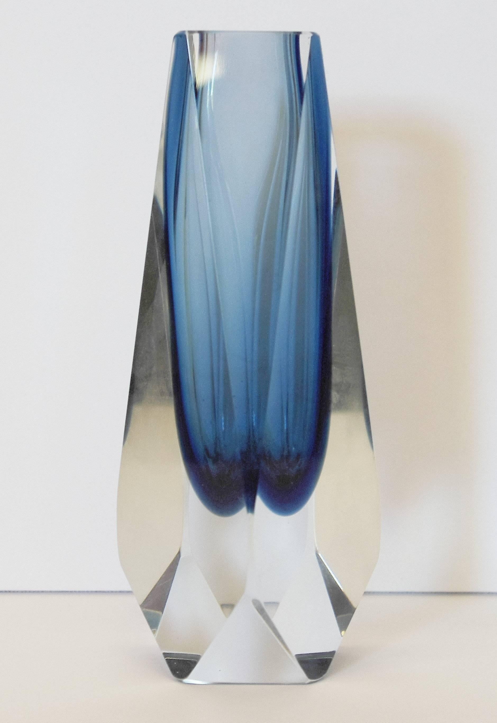 Original vintage Italian vase in Sommerso technique using different layers of Murano glass to produce a dark blue immersed color. Made in Italy in the 1960s.
Measures: Diameter 2.5 inches, height 6.5 inches.
One in stock in Palm Springs.
Order