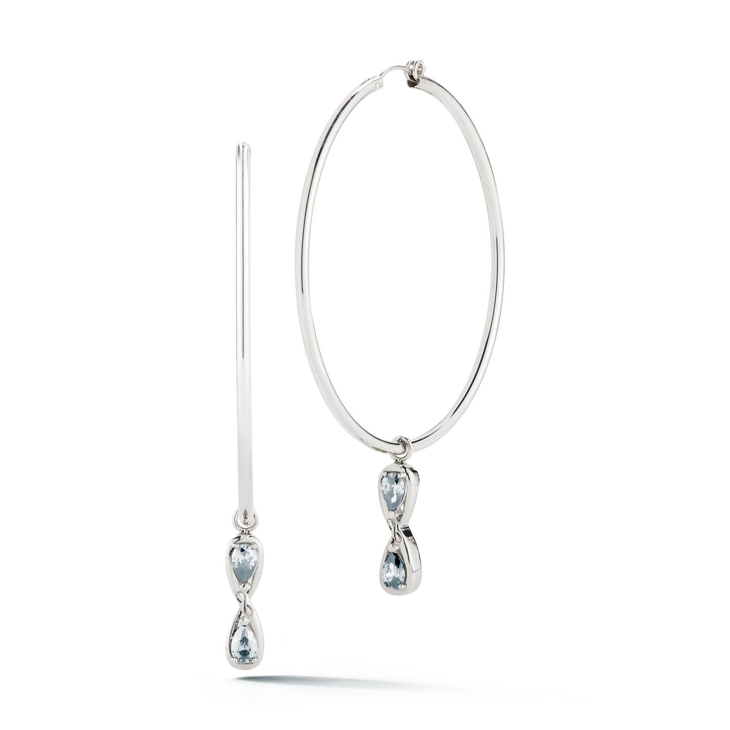Designed in NYC

.925 Sterling Silver 6 x 4 mm Dark Blue Topaz Infinity Stone Dangle Hoops. When it comes to self-expression, the style possibilities are endless. Infinity stone dangle hoops:

Sterling silver 
High-polish finish
Light-weight 
Light