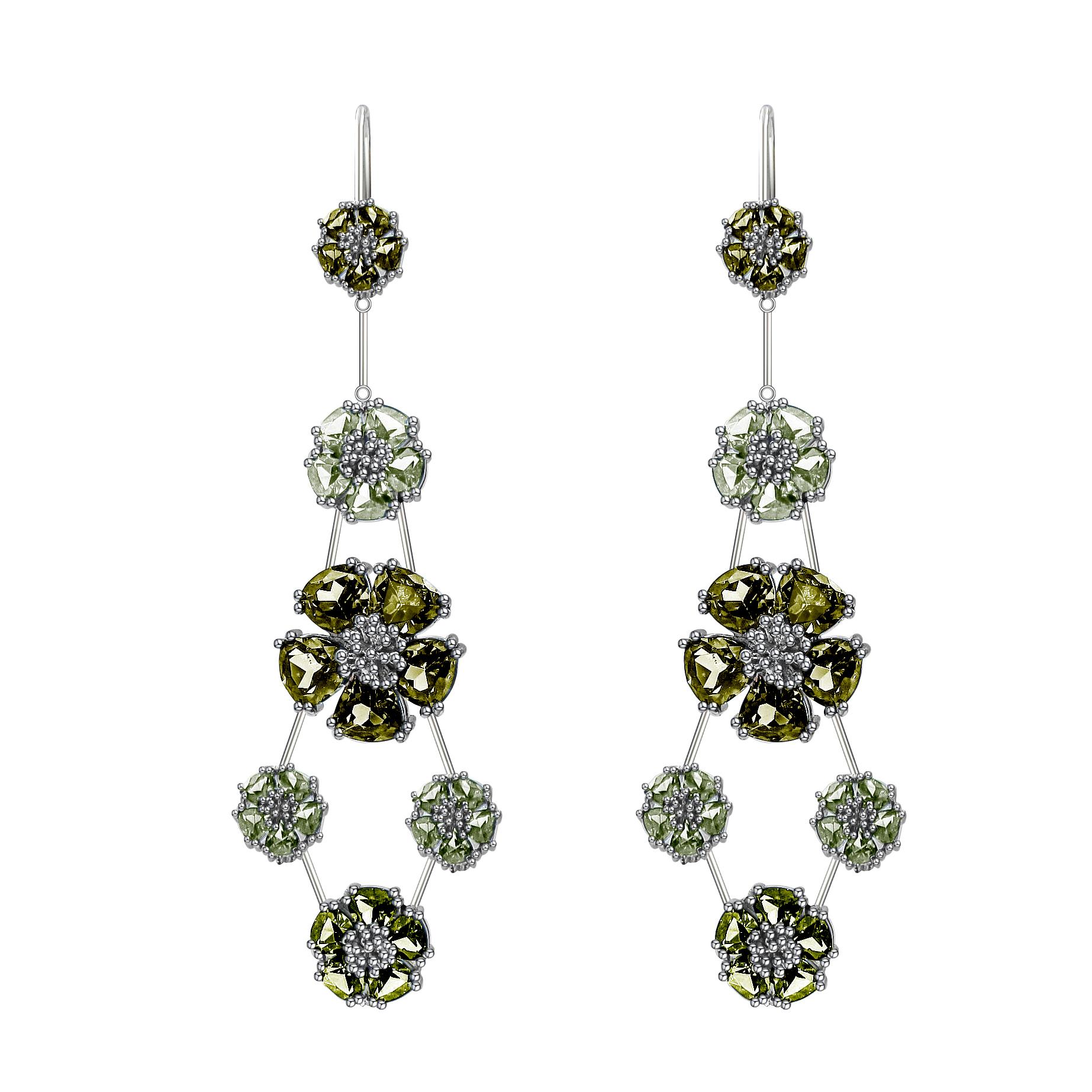 Designed in NYC

.925 Sterling Silver 6 x 7mm, 10 mm and 15 mm Dark Blue Topaz and Light Blue Topaz Blossom Double-Tier Chandelier Earrings. No matter the season, allow natural beauty to surround you wherever you go. Blossom double-tier chandelier