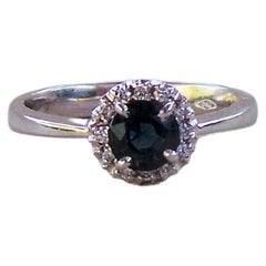 Dark Blue Sapphire Round 0.6K Diamonds 0.10K White Gold Engagement Ring