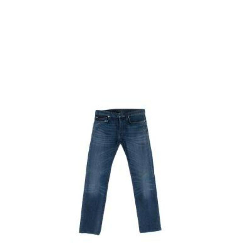 Dior Dark Blue Slim Fit Jeans 
 
 
 
 - Structured cotton body
 
 - Deep blue 
 
 - Straight leg 
 
 - Five pockets
 
 - Button fly with hook and bar fastening 
 
 
 
 Materials:
 
 93% Cotton 
 
 5% Polyester 
 
 2% Elastane 
 
 
 
 Made in Italy 
