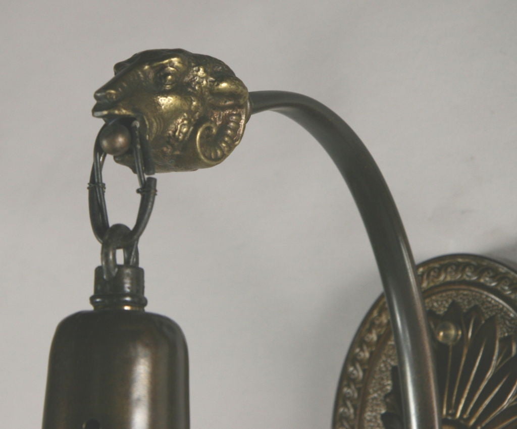 Italian Dark Brass Ram Sconce( one available) For Sale