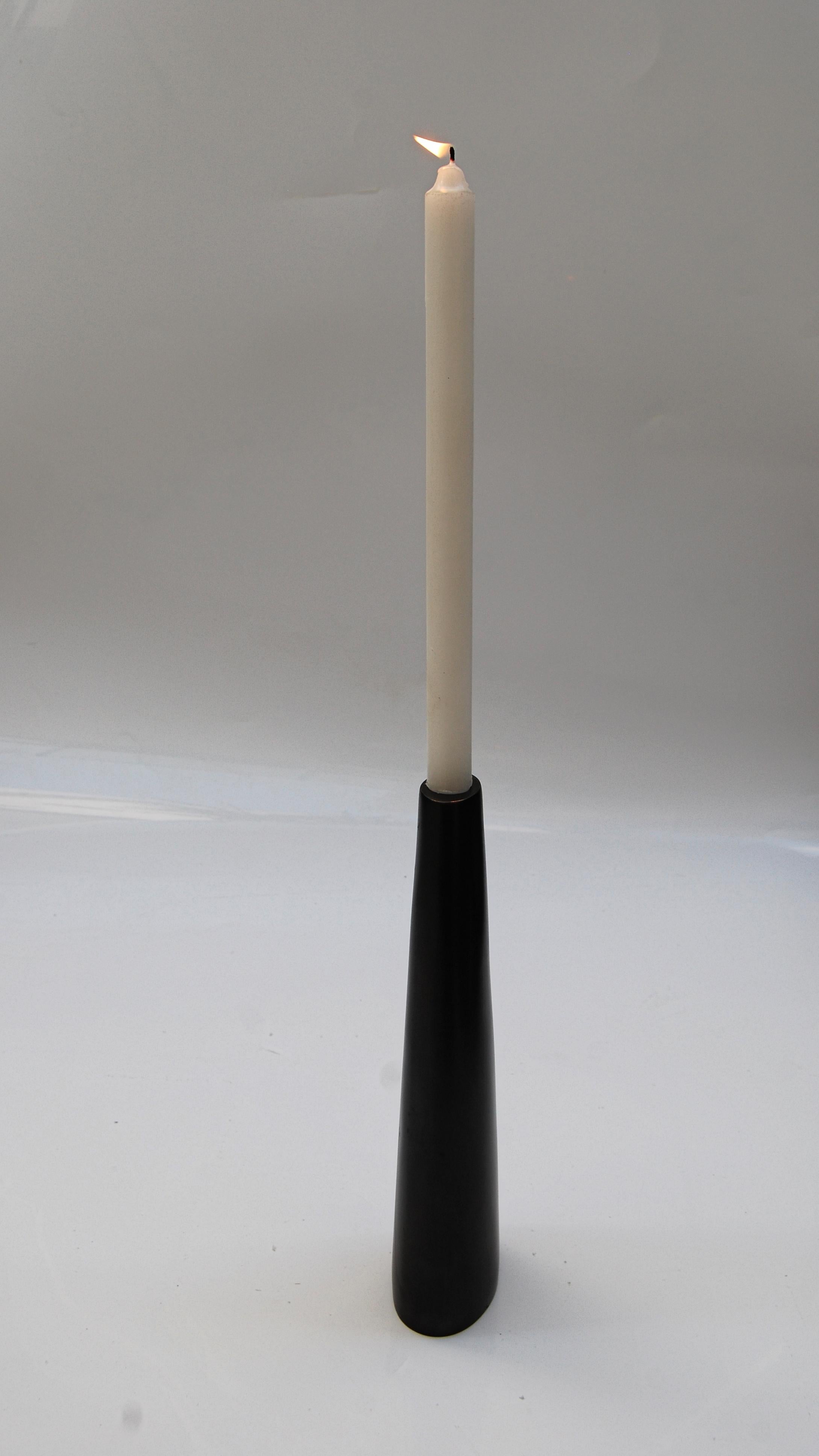 Dark bronze candleholder by FAKASAKA Design.
Dimensions: W 9.5 x D 5.5 x H 29.5 cm.
Materials: dark bronze.
 