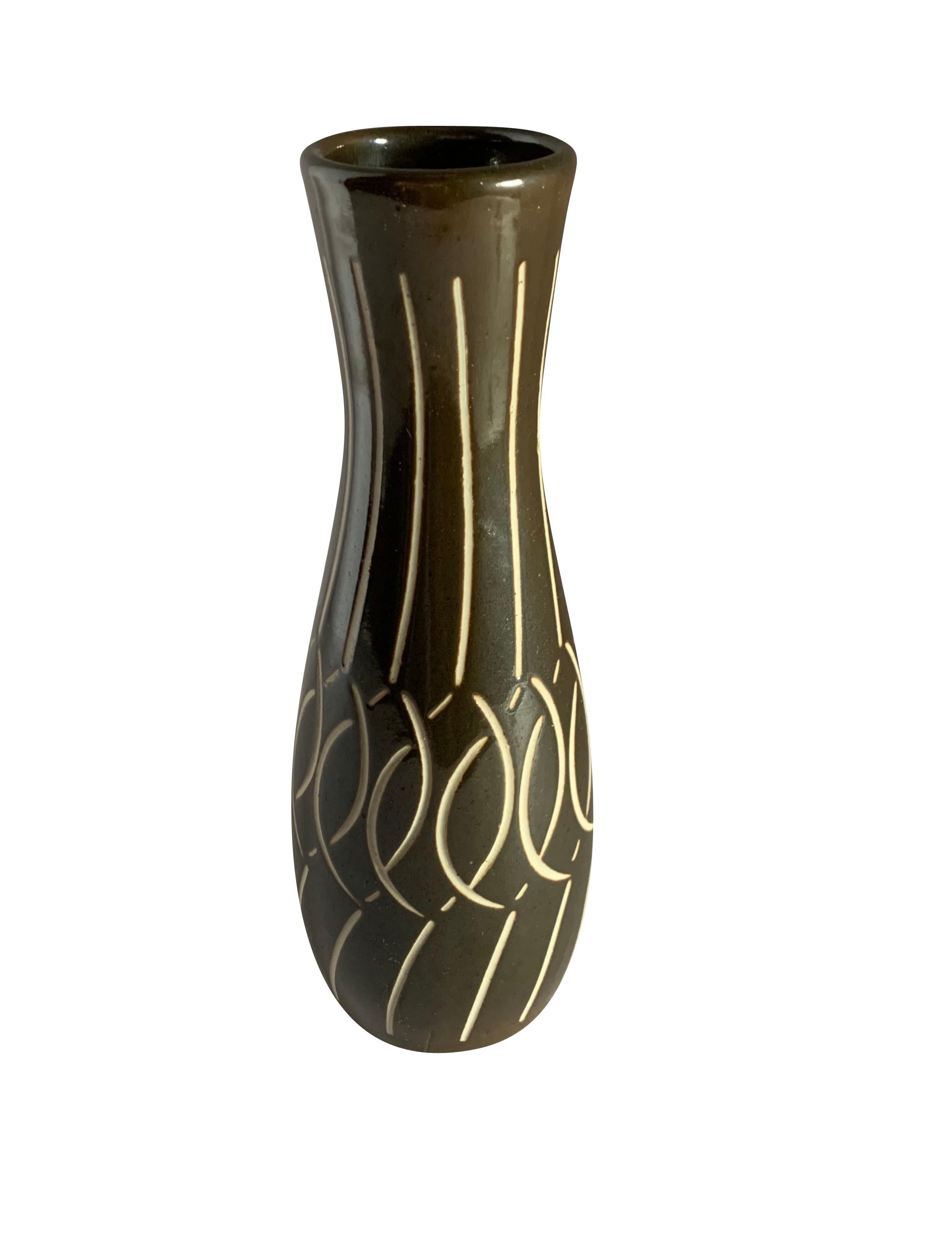 Mid century East German vase.
Dark brown and cream decorative design.
Part of a large collection.