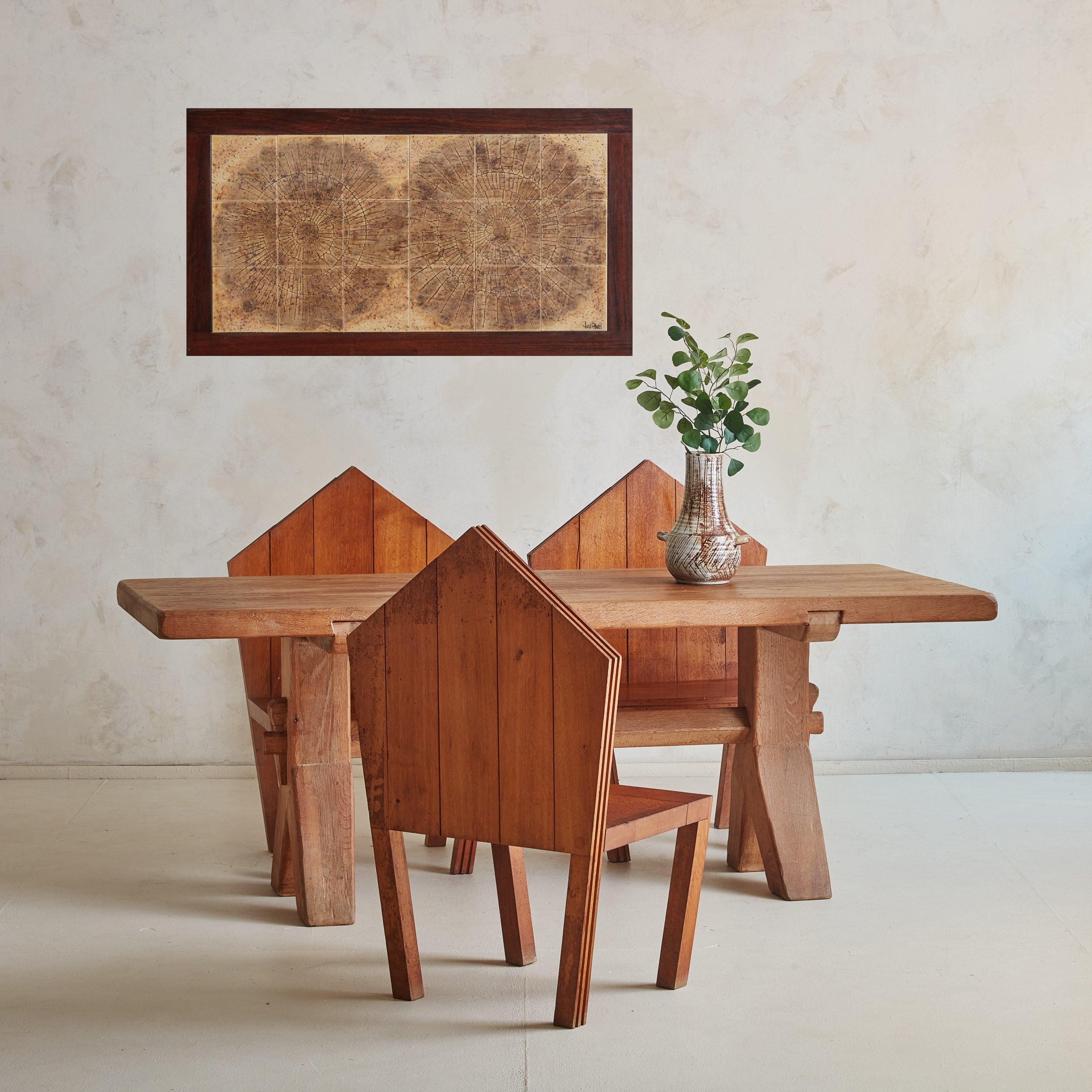 A 1960s French table top wall sculpture signed by ceramic artist Jean D'asti. During the Mid 20th Century, Jean D'asti operated his workshop in Vallauris, a picturesque seaside village in the South of France renowned for its pottery. This piece has