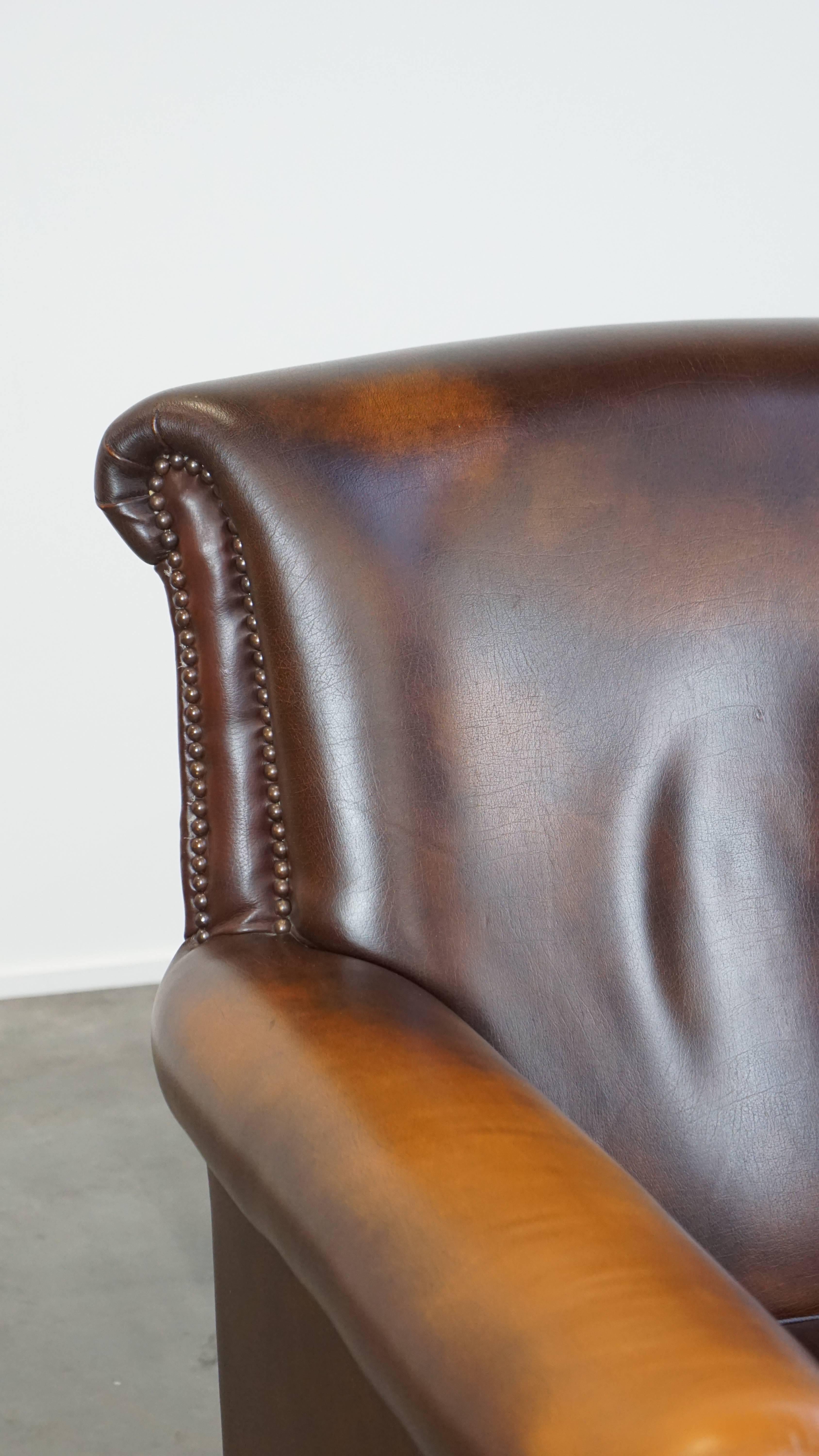 Dark brown cow leather English style armchair with a robust appearance For Sale 5