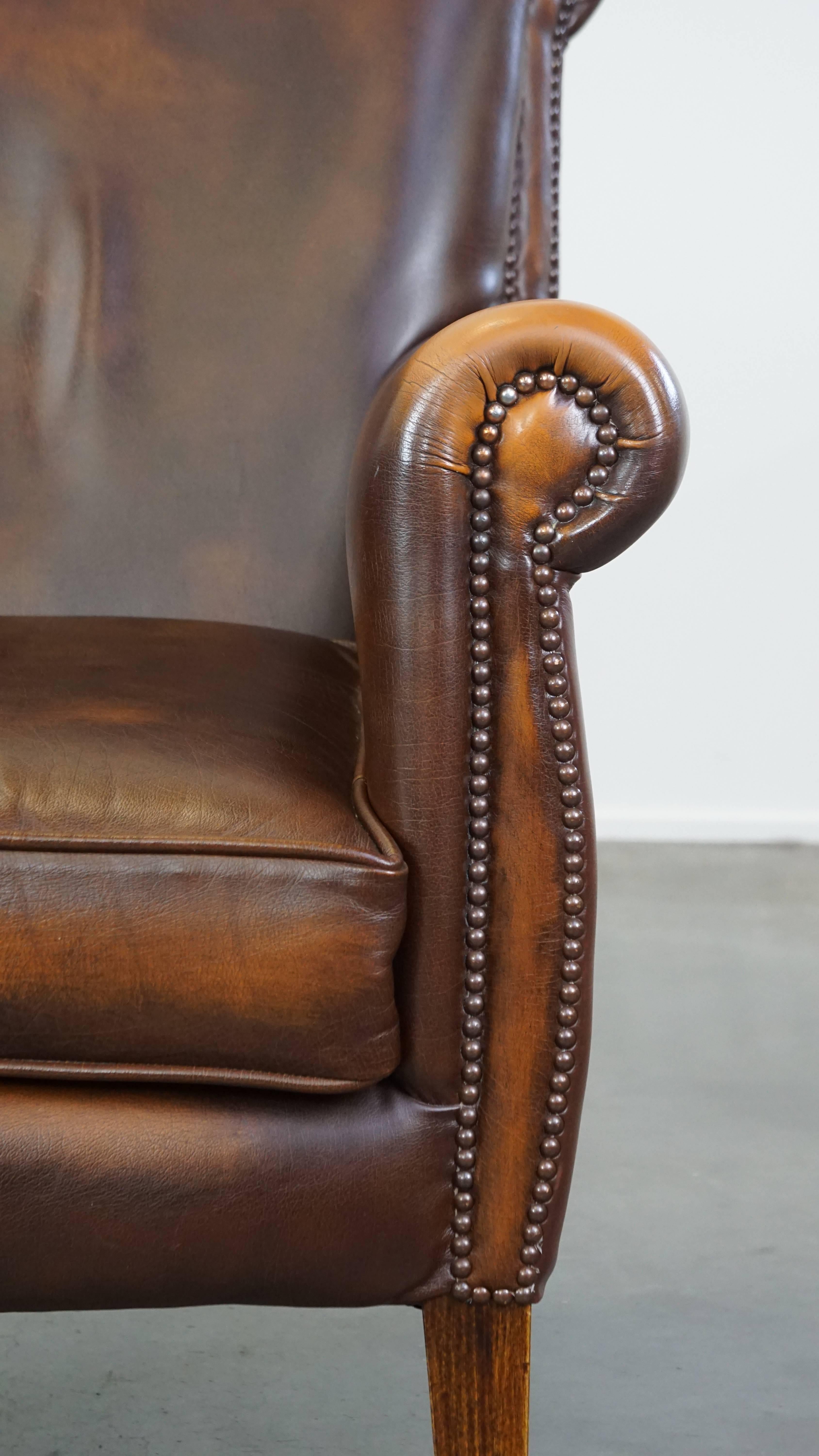 Dark brown cow leather English style armchair with a robust appearance For Sale 6