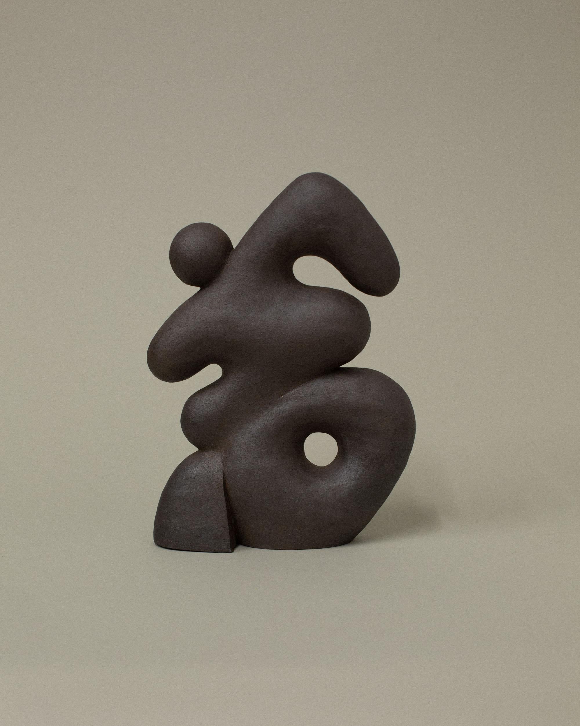 Dark Brown Hermes Sculpture by Common Body
Dimensions: W 23 x D 9 x H 32 cm
Materials: Dark Brown Stoneware

Common body is a sculpture and interior object studio founded by nathaniel kyung smith, an artist whose passion lies in the intersection of