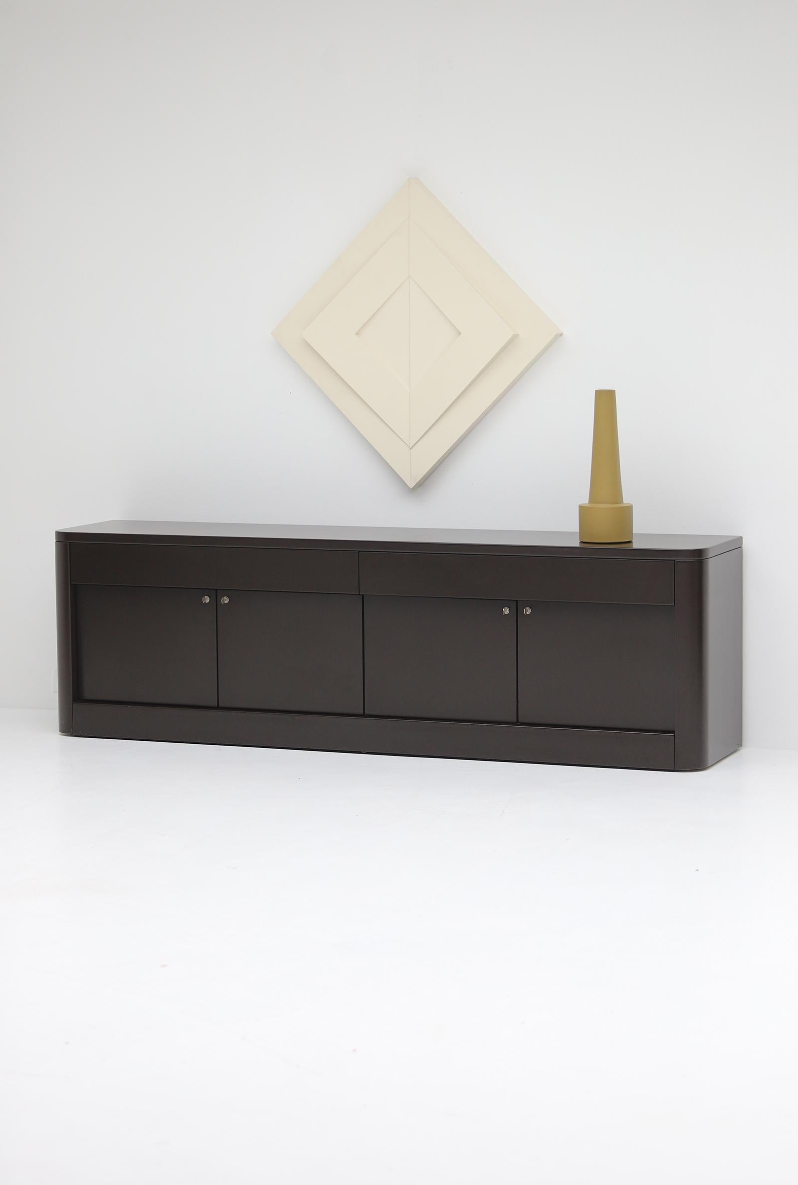 When design becomes science fiction. This dark brown sideboard was designed by Ghent based designer Frank De Clercq in 1967. Its minimalist shape and style reminds me the science fiction movie settings of the late 60s and 70s. Directors such as
