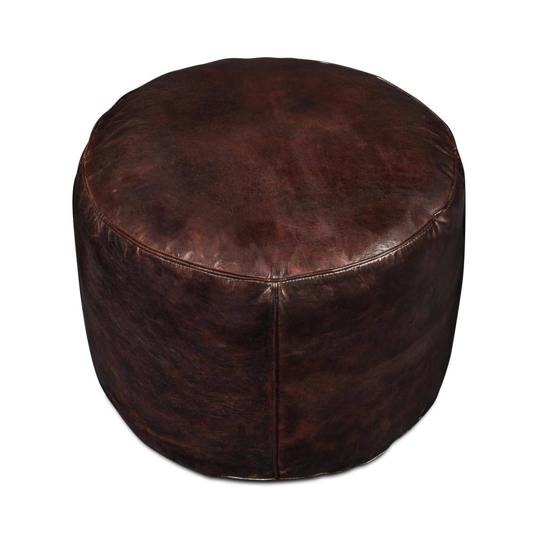 Its rich, weathered leather adds a touch of timeless elegance, perfect for complementing a classic or rustic decor theme. With dimensions of 22