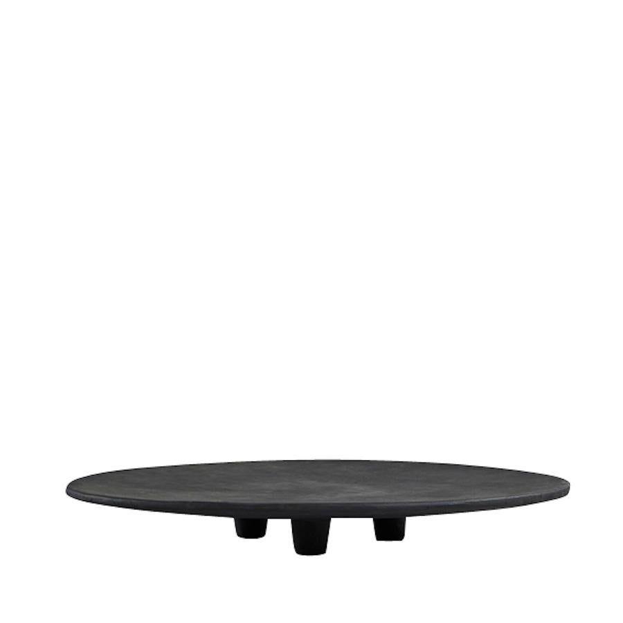 Contemporary Danish design large round footed platter.
Base is three cylinder shapes.
Matte dark coffee colored glaze.
One of a collection of many shapes and sizes.