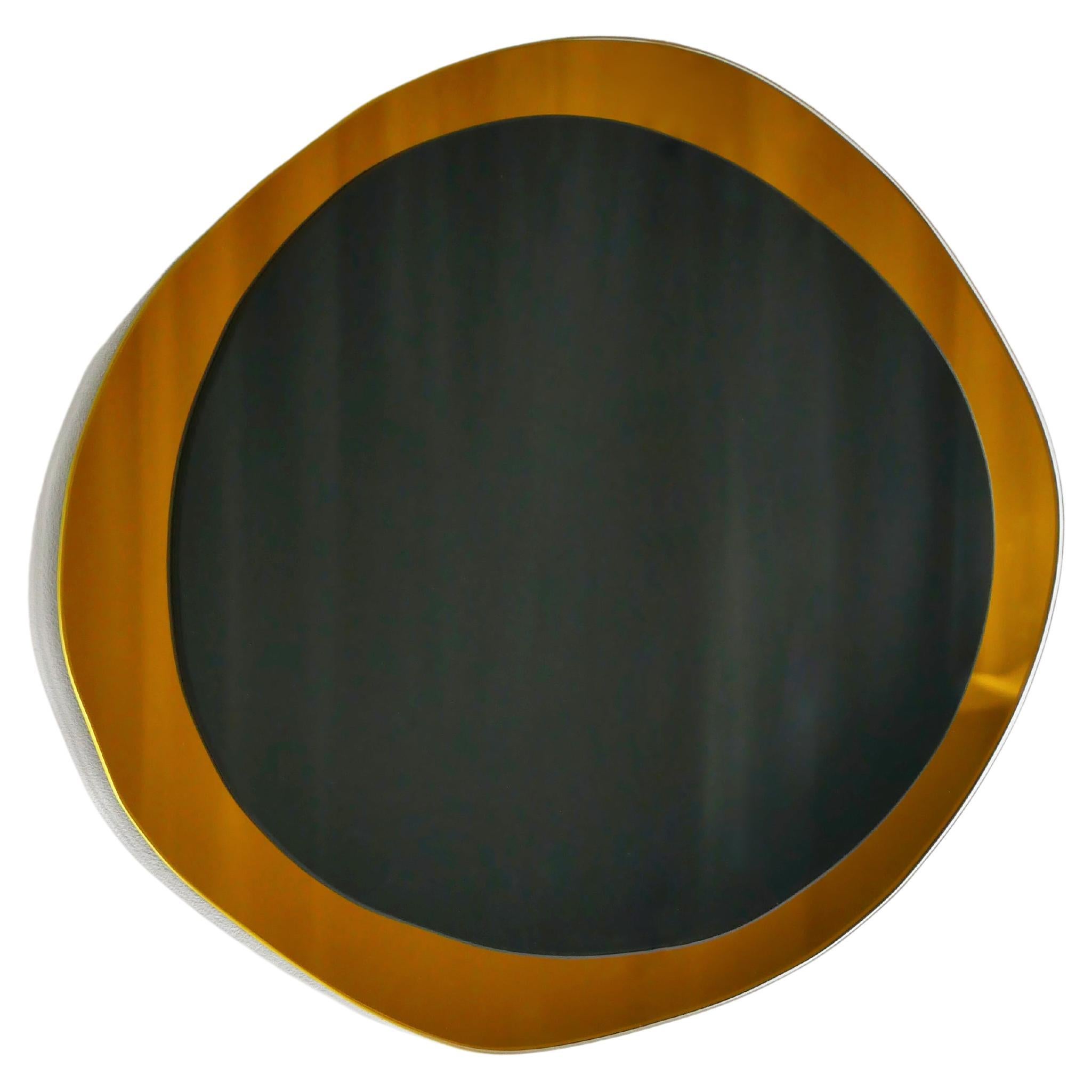 Dark Eclipse large hand-sculpted mirror, Laurene Guarneri
Limited edition.
Handmade.
Materials: gold colored mirror, dark colored mirror.
Dimensions: 100 x 100 cm

Laurène Guarneri is a designer based in Paris.
Graduated in master's degree