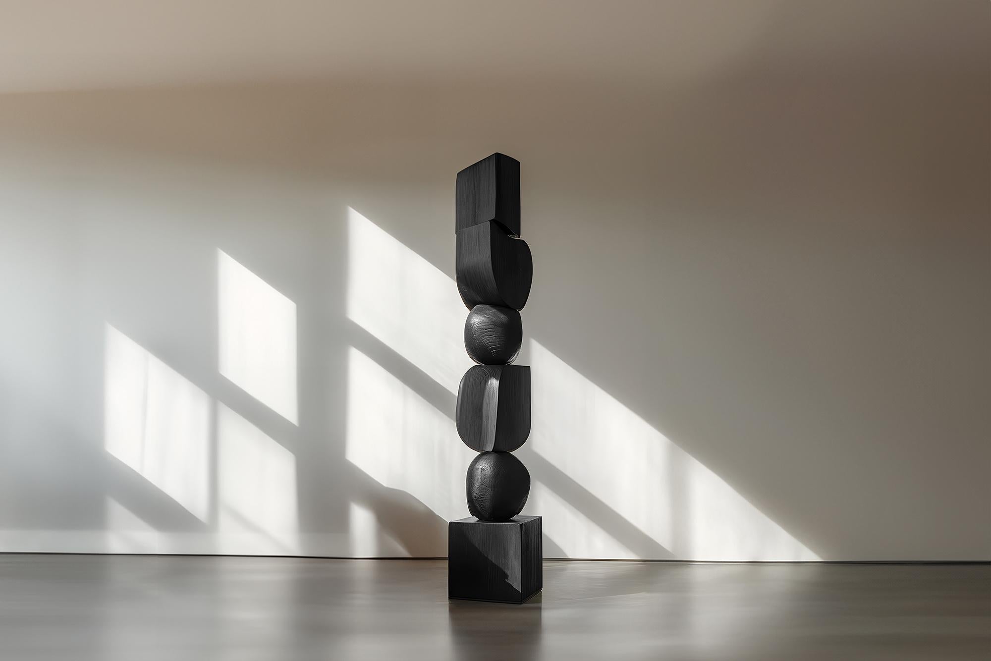 Dark, Elegant Black Solid Wood Design Materializes, Still Stand No91

——

Joel Escalona's wooden standing sculptures are objects of raw beauty and serene grace. Each one is a testament to the power of the material, with smooth curves that flow into