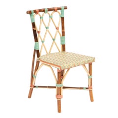 Sedia Juliette in rattan con telaio scuro di Creel and Gow