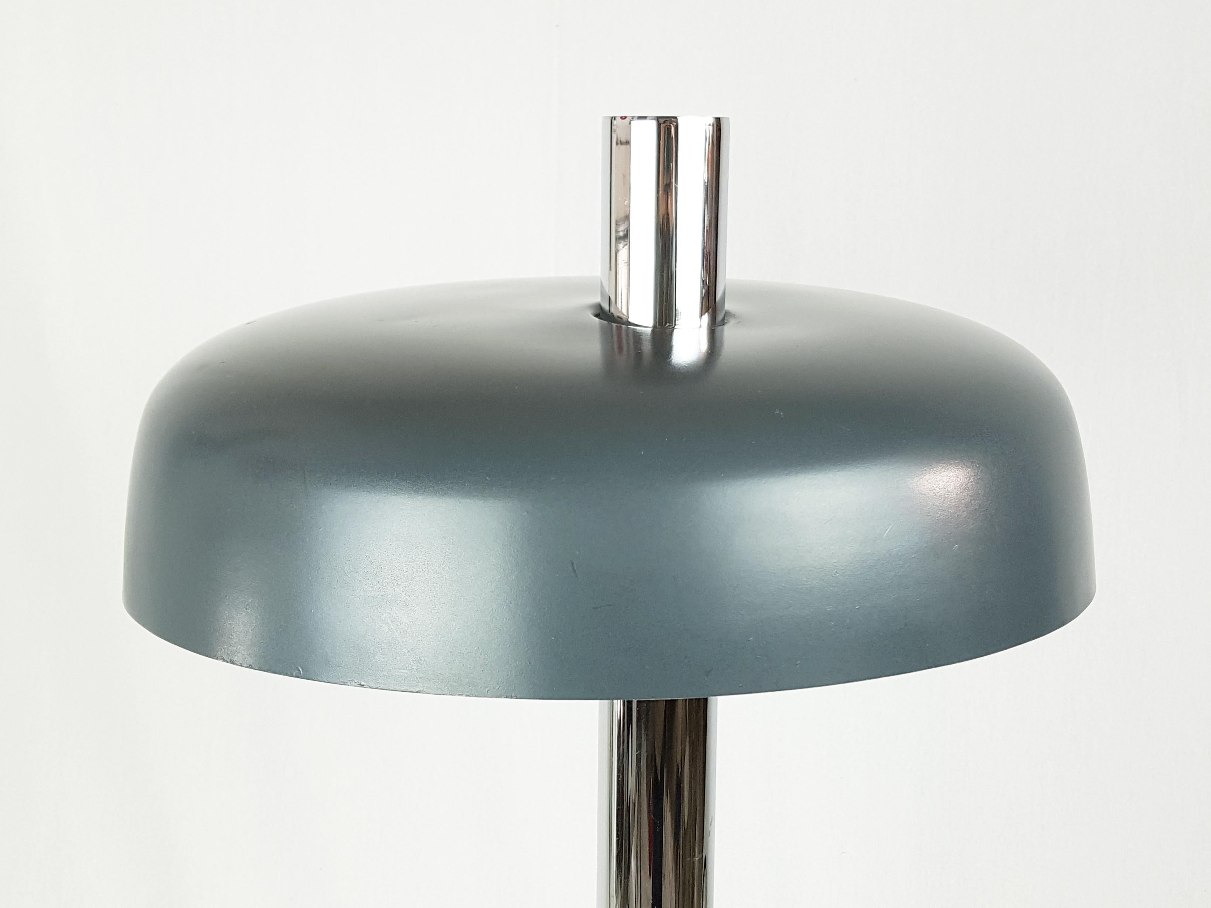 Table or desk lamp produced in Germany by Egon Hillebrand for Hillebrand Lighting, since 1967. Dark gray / cobalt blue painted aluminium lamp shade, chrome-plated metal structure with built-in switch. 2 E27 lamp sockets. Very good condition. Some