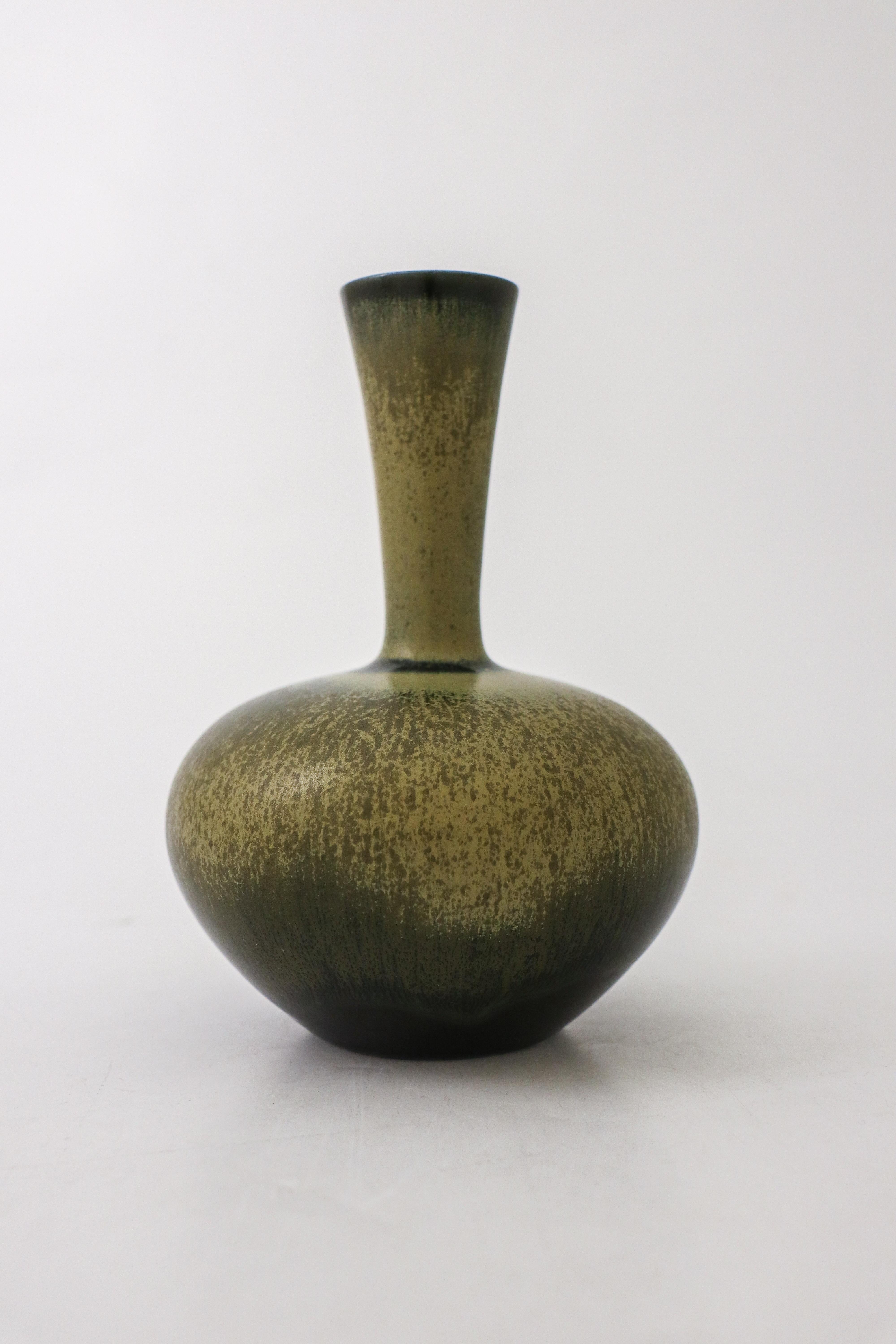 A lovely dark green vase with a har fur glaze designed by Sven Wejsfelt at Gustavsberg in Stockholm in 1986. The vase is 16.5 cm high. It's marked as on picture. It is in excellent condition.