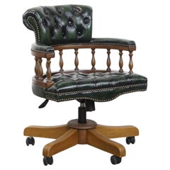 Dark green cowhide leather and wood chesterfield office chair on wheels