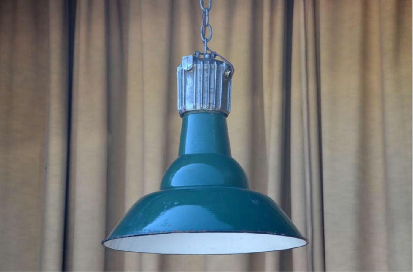 Dark green French industrial workshop hanging light.