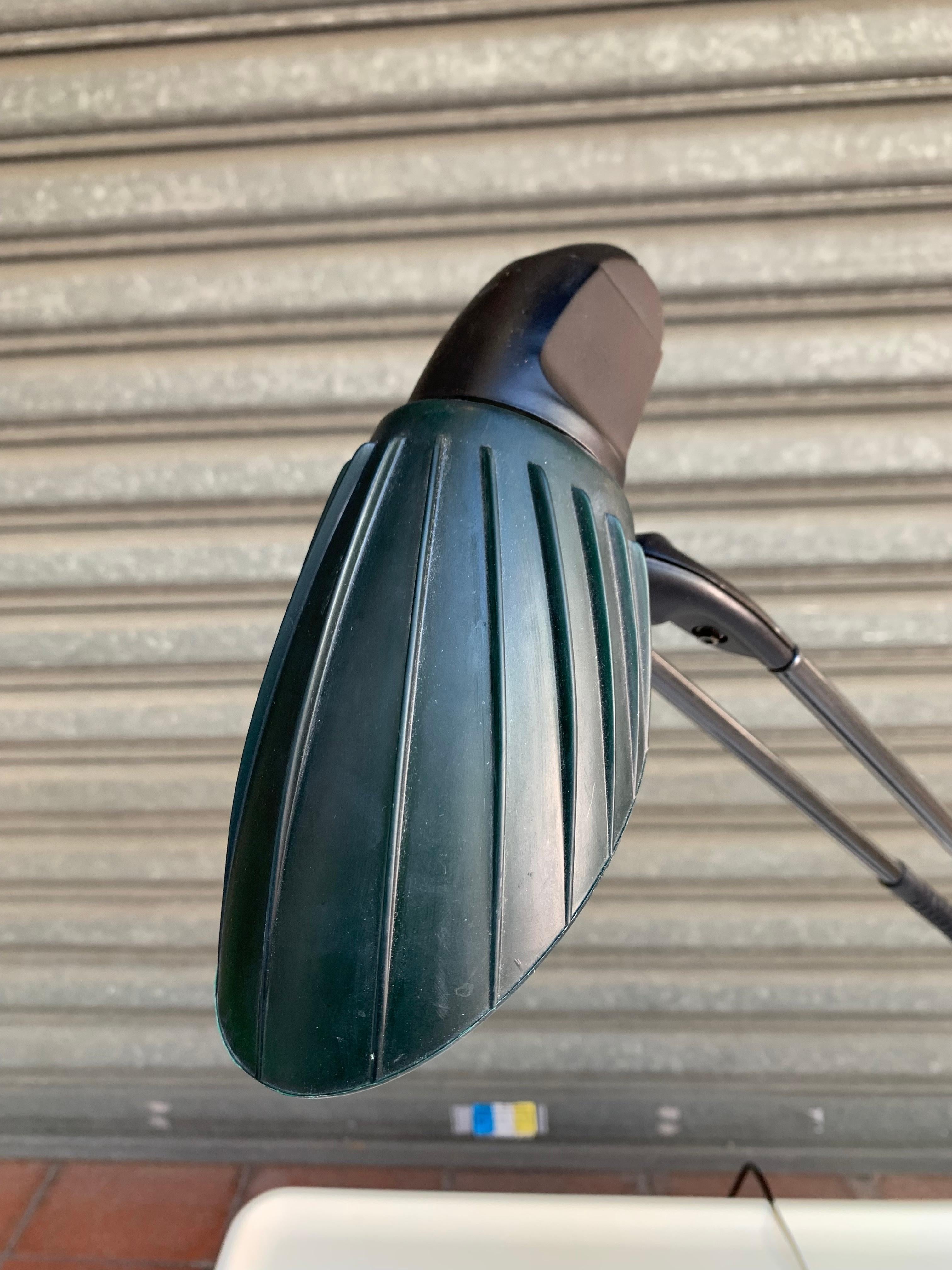 Dark green Tango lamp by Stephan Copeland
Arteluce edition, circa 1989
Aluminum and plastic
Dimensions: 100 x 40 x 24 cm.

 