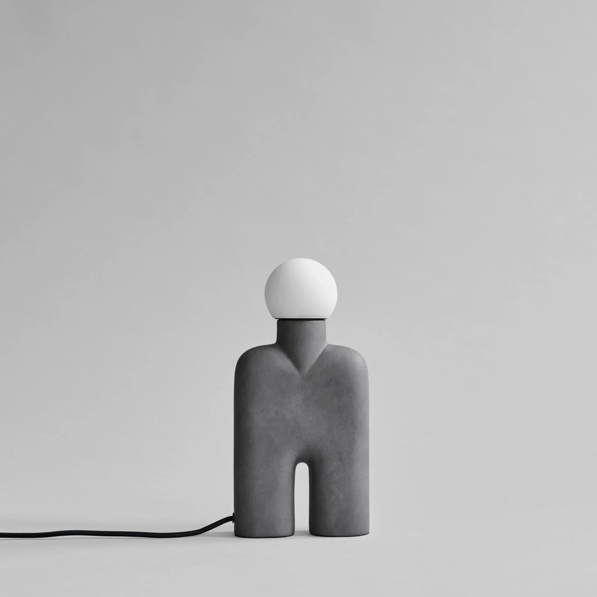 Dark grey ceramic table lamp, contemporary work.

Dark grey ceramic table lamp.
As the base of the ceramic lamp is a hand-glazed natural product, colours may vary slightly. slightly.

Colour: dark grey
Material: Ceramic
Cable: Cable-covered fabric